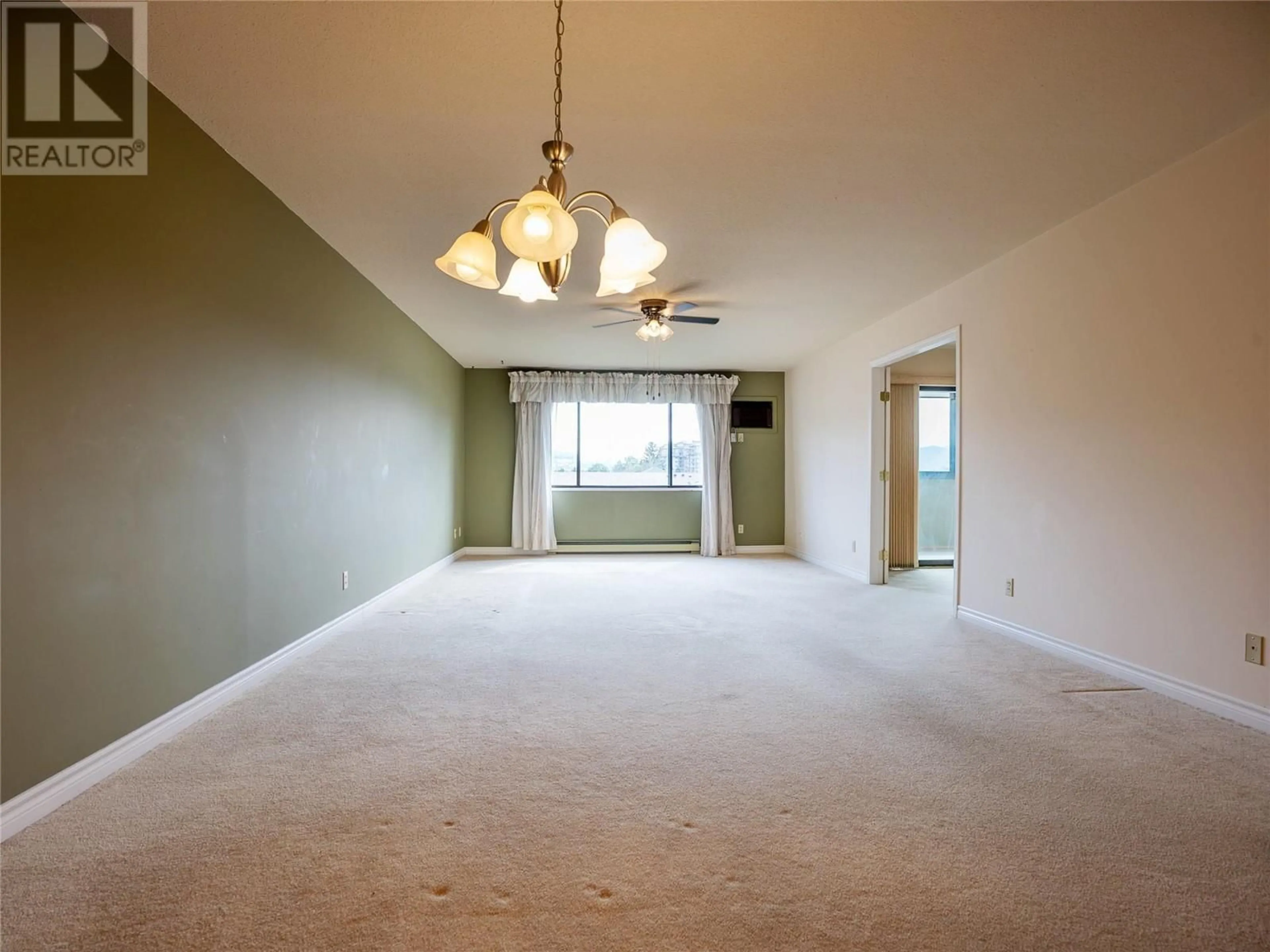 A pic of a room, carpet floors for 1820 Atkinson Street Unit# 301, Penticton British Columbia V2A7M6