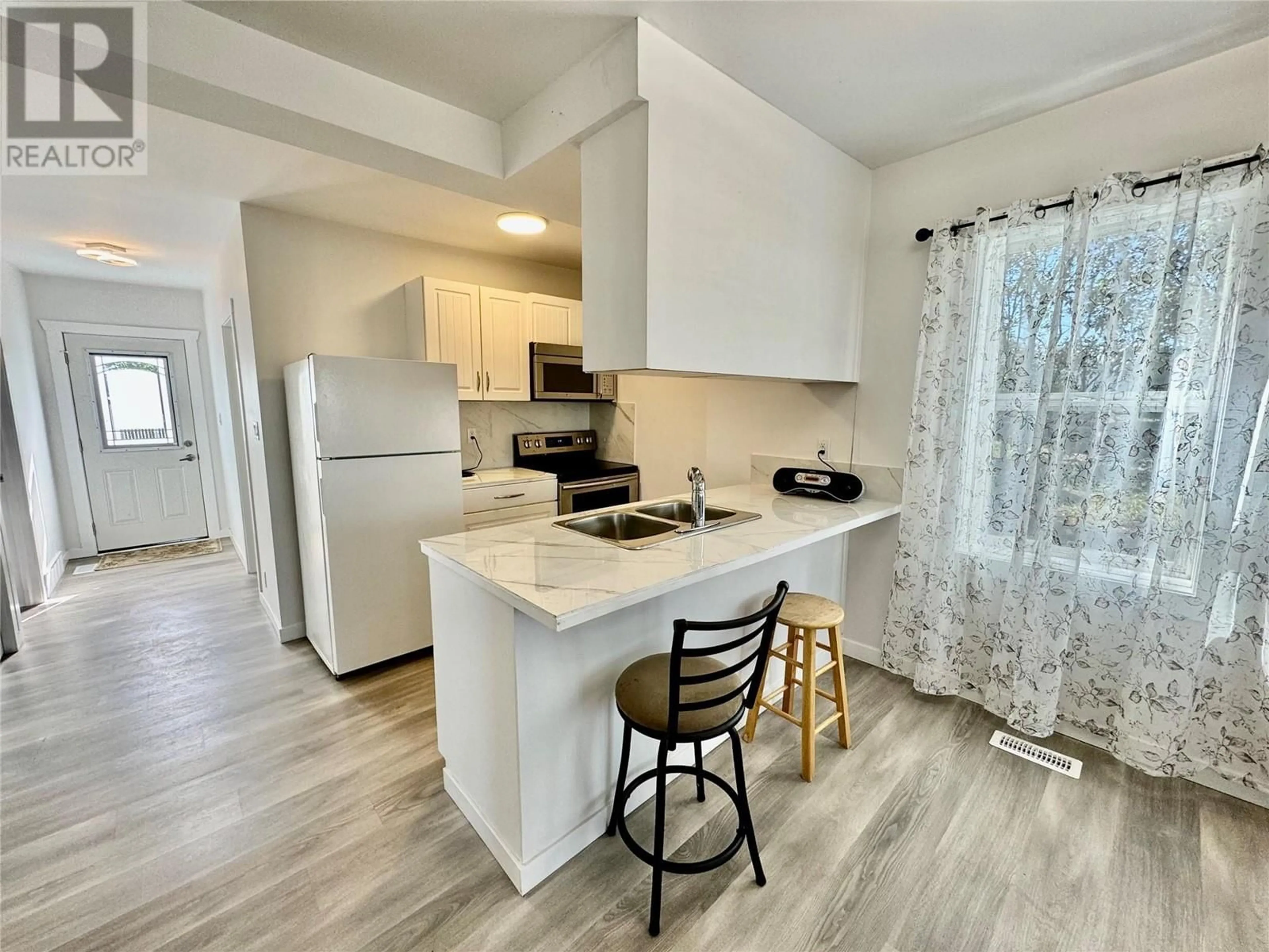 Open concept kitchen, unknown for 5013 52 Avenue, Pouce Coupe British Columbia V0C2C0