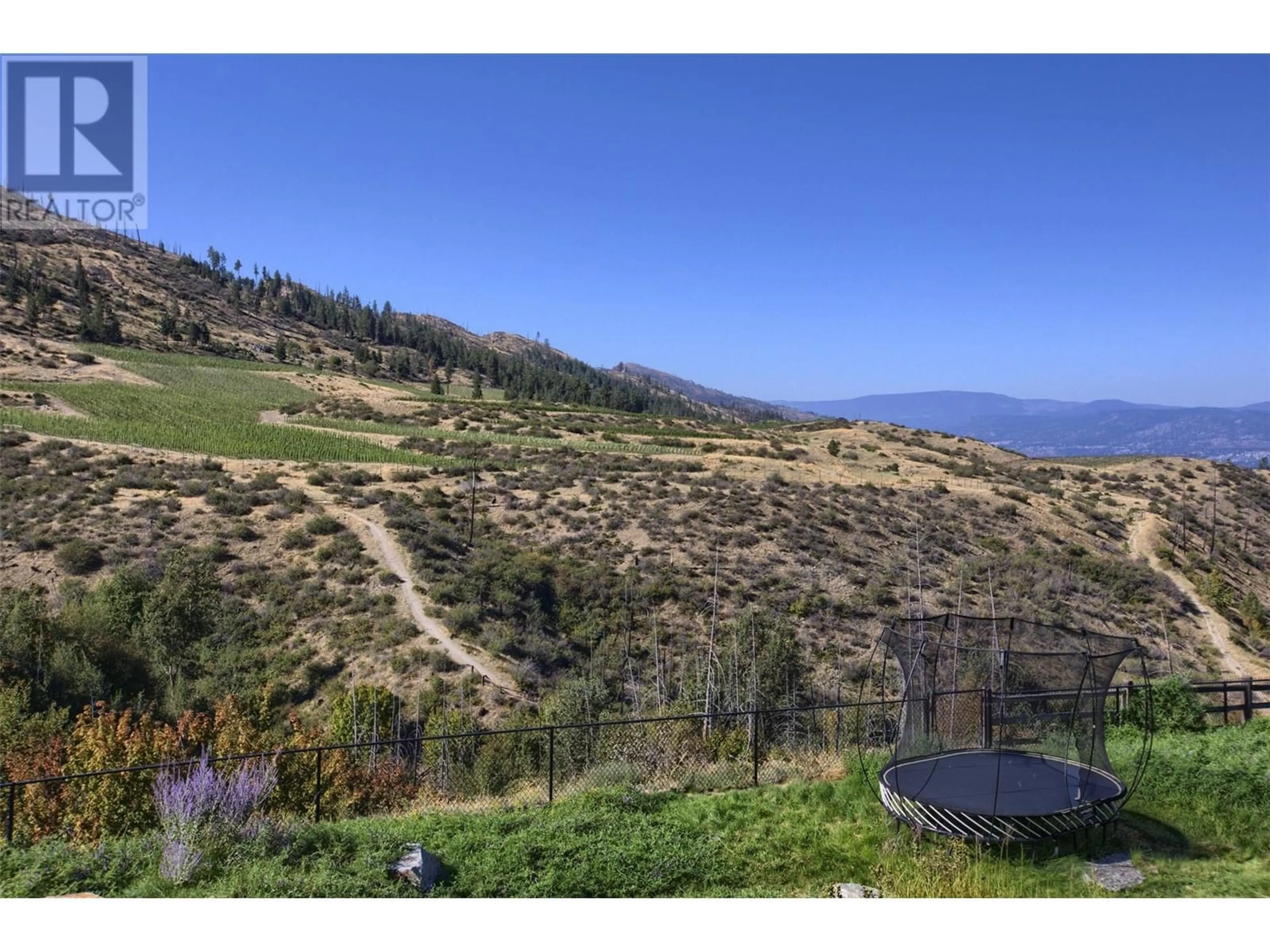 A pic from exterior of the house or condo, the view of mountain for 373 Farron Court, Kelowna British Columbia V1W5H2