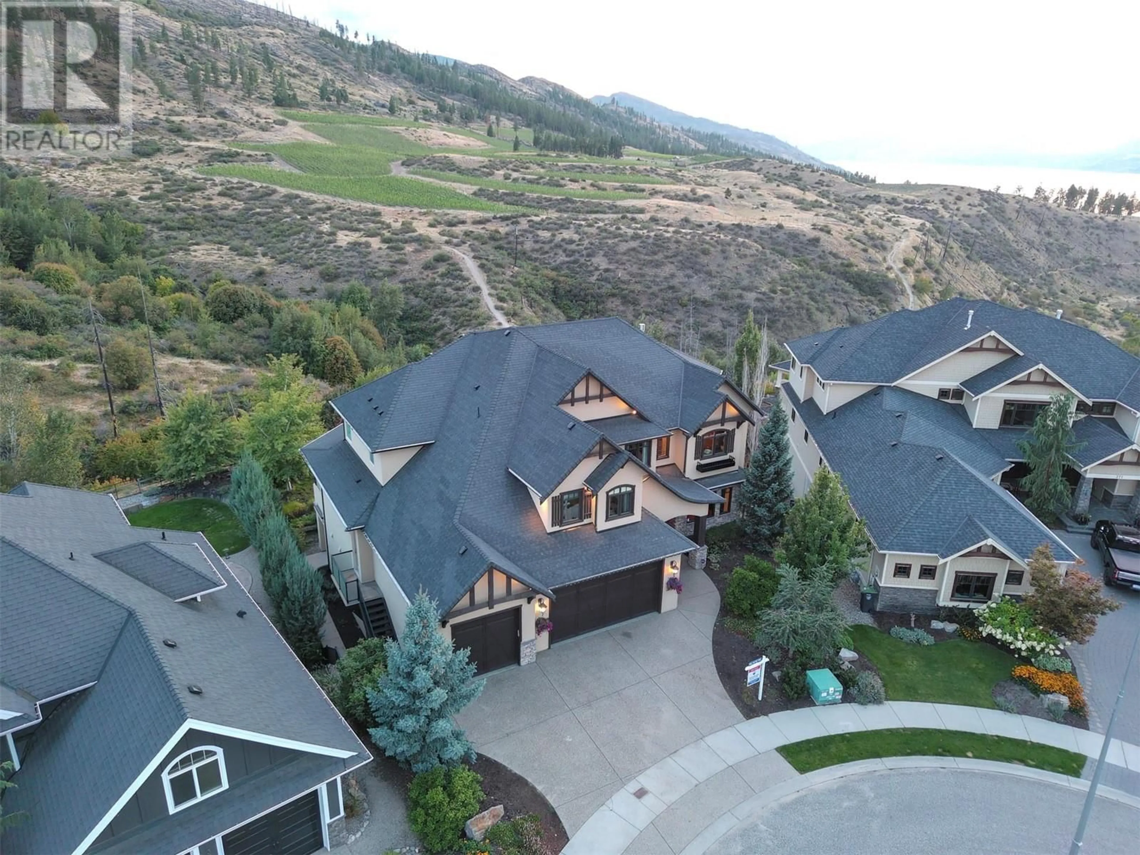 Frontside or backside of a home, mountain for 373 Farron Court, Kelowna British Columbia V1W5H2