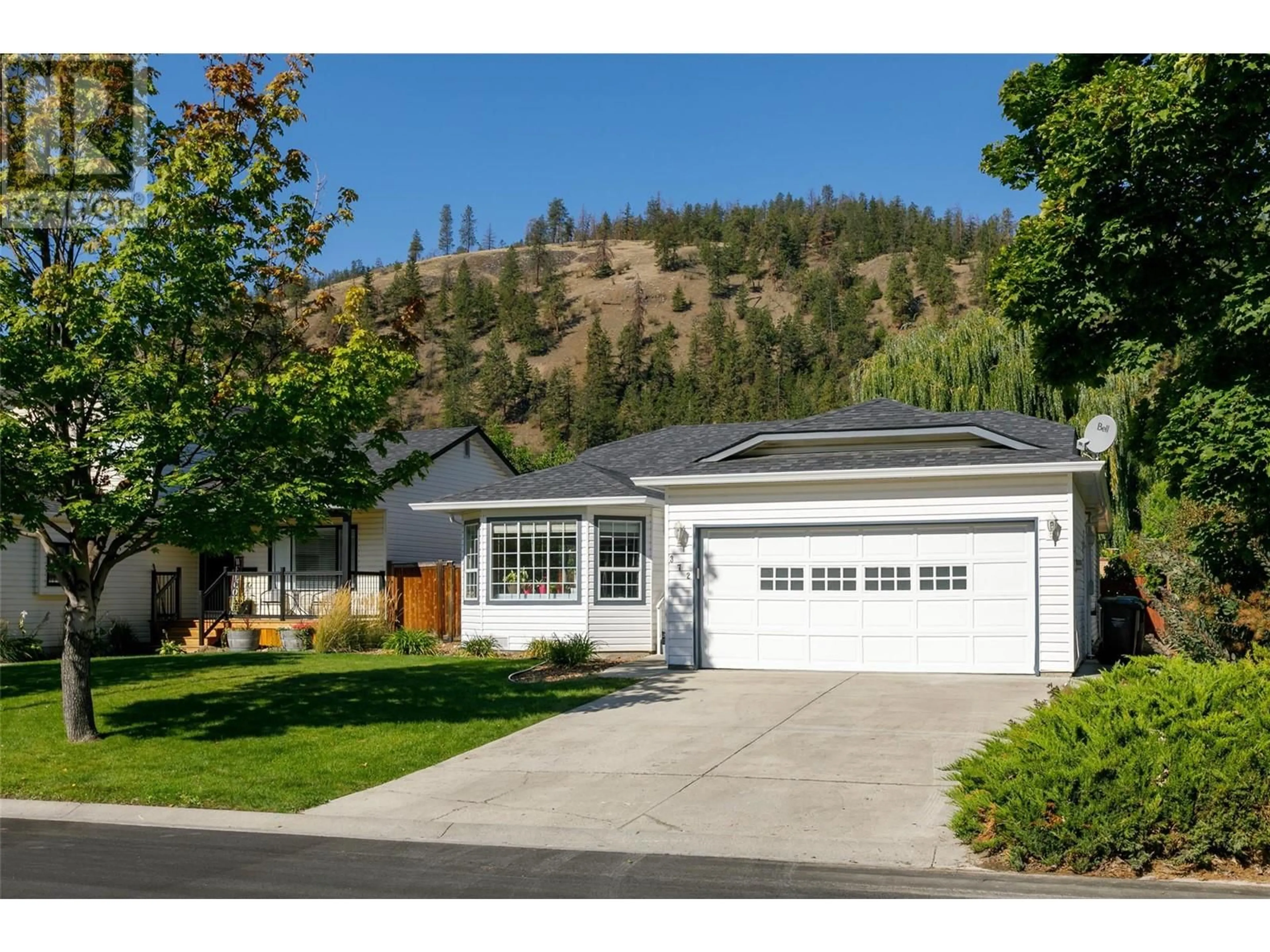 Frontside or backside of a home, cottage for 372 Mctavish Road, Kelowna British Columbia V1V1P1