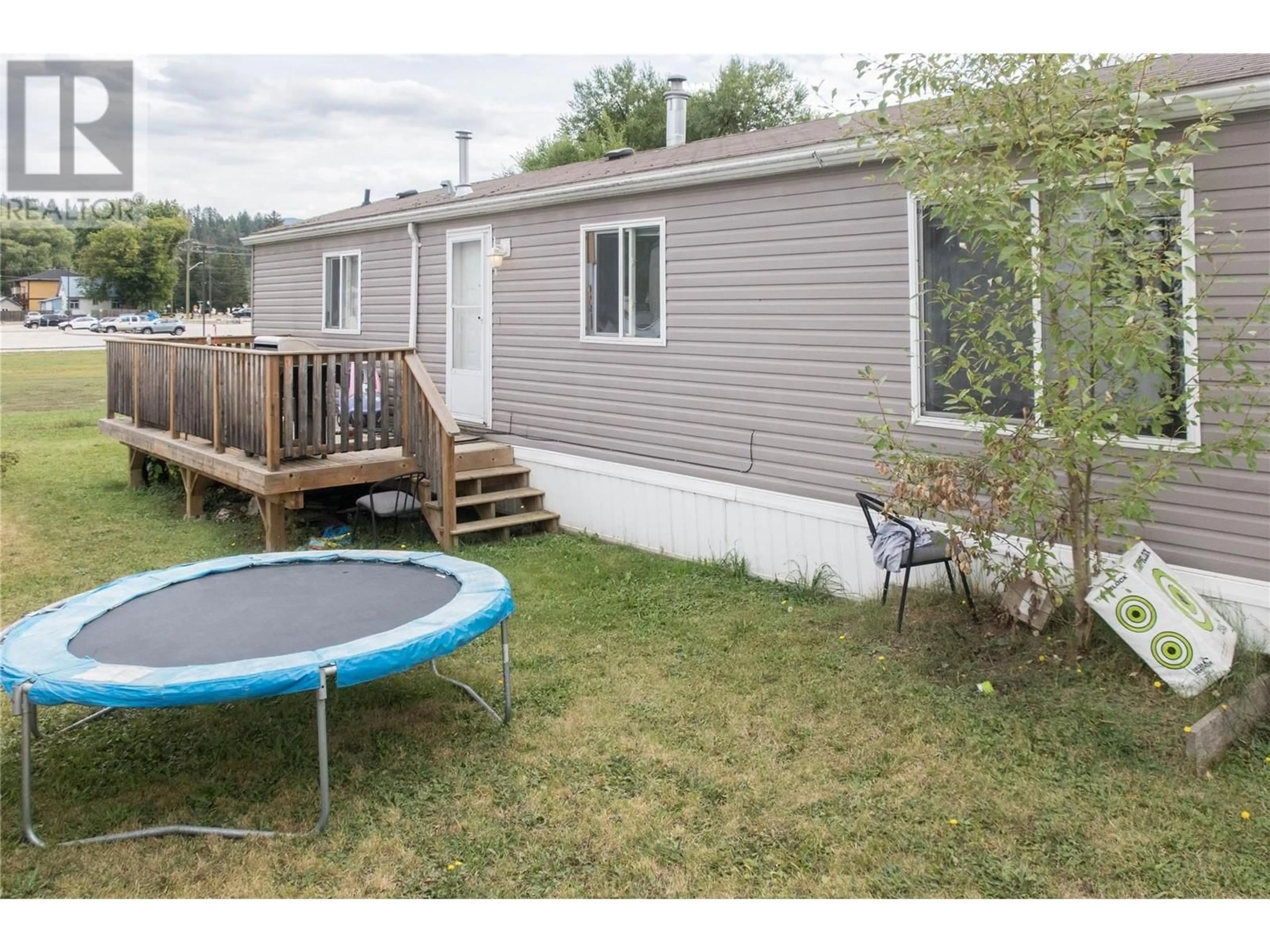 Patio, the fenced backyard for 2313 Shuswap Avenue Unit# 3, Lumby British Columbia V0E2G0