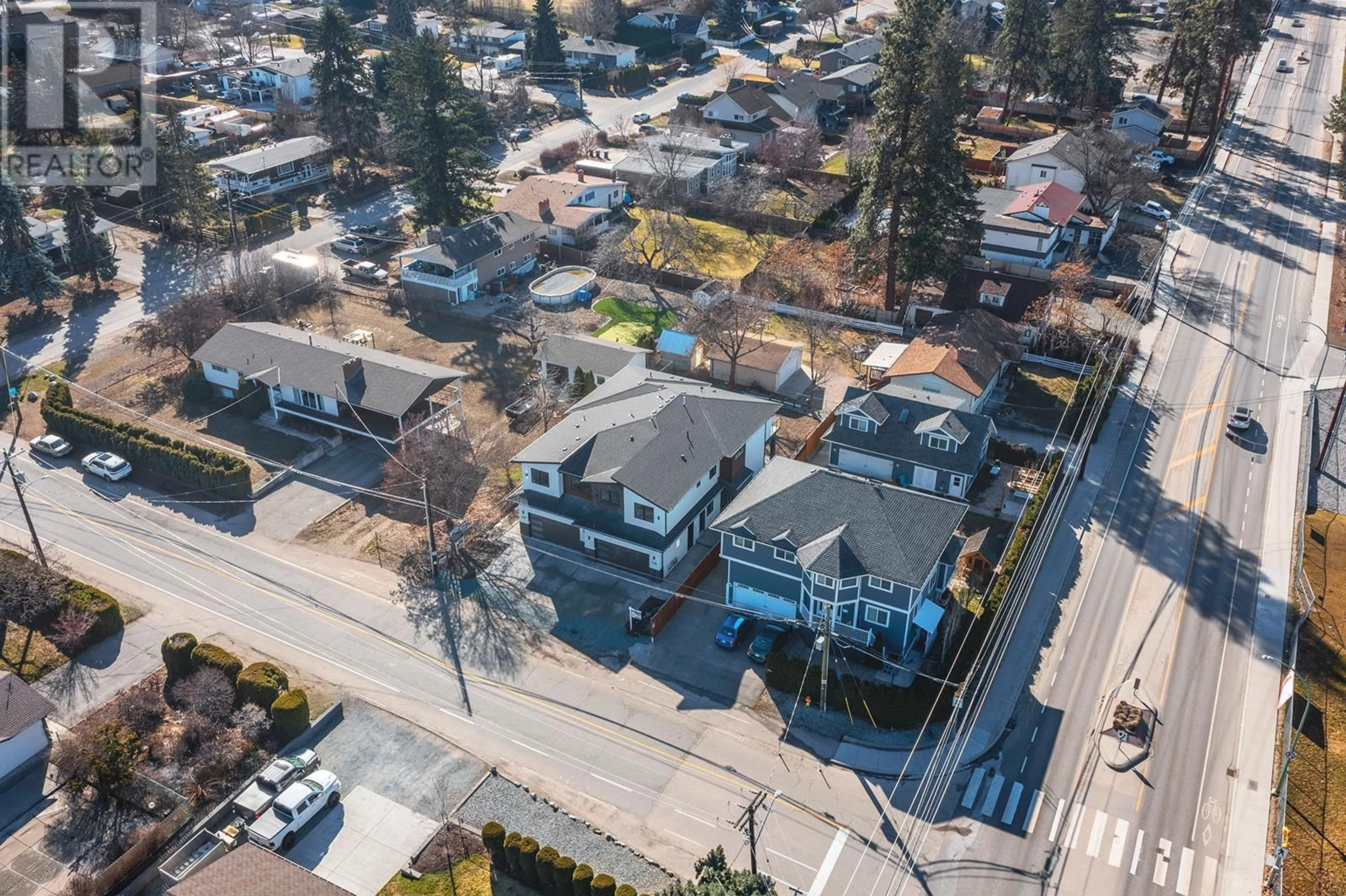 A pic from exterior of the house or condo, the street view for 705 Raymer Road, Kelowna British Columbia V1W1H6