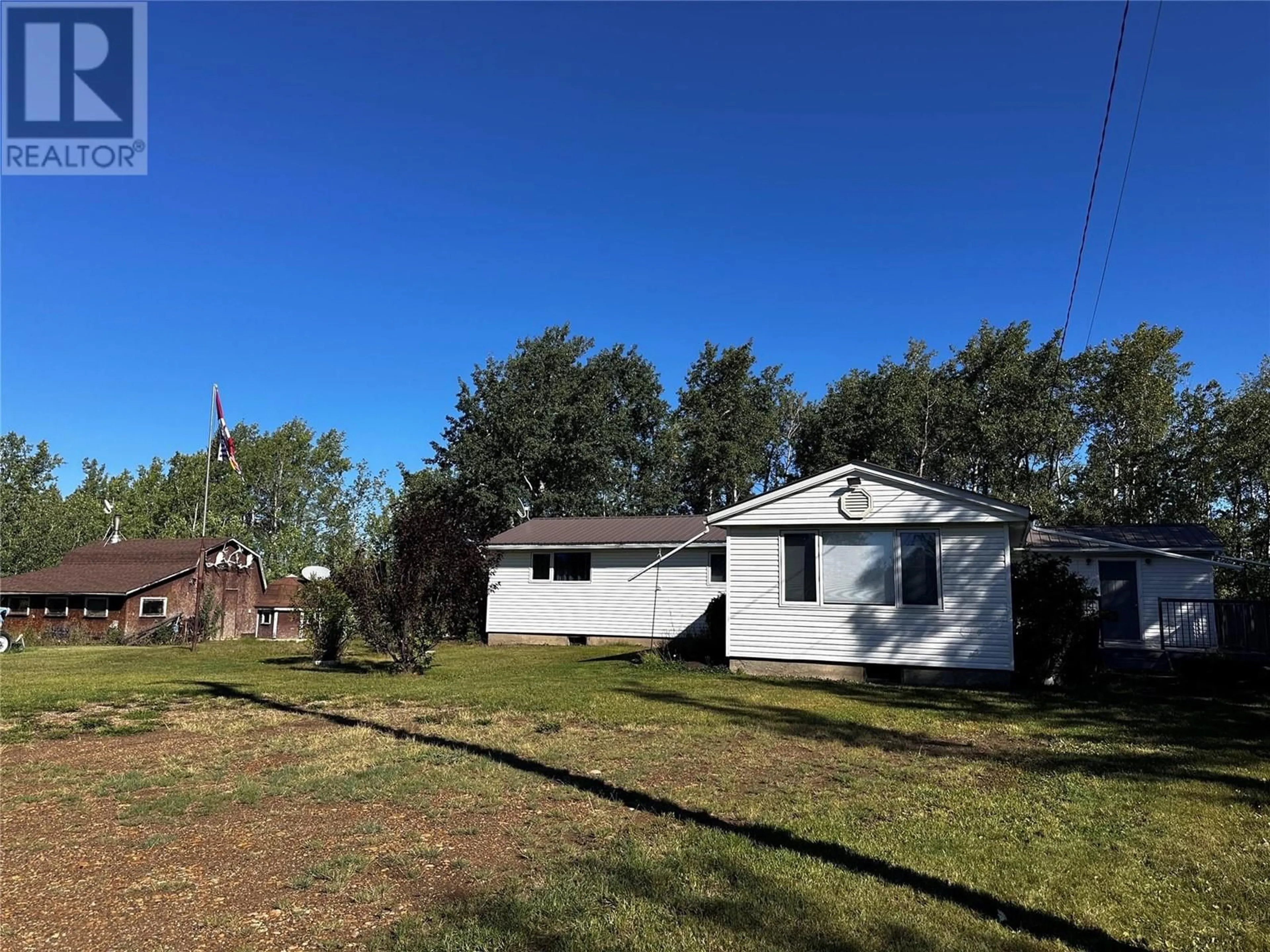 Frontside or backside of a home, cottage for 5112 97 Highway, Dawson Creek British Columbia V0C1N0