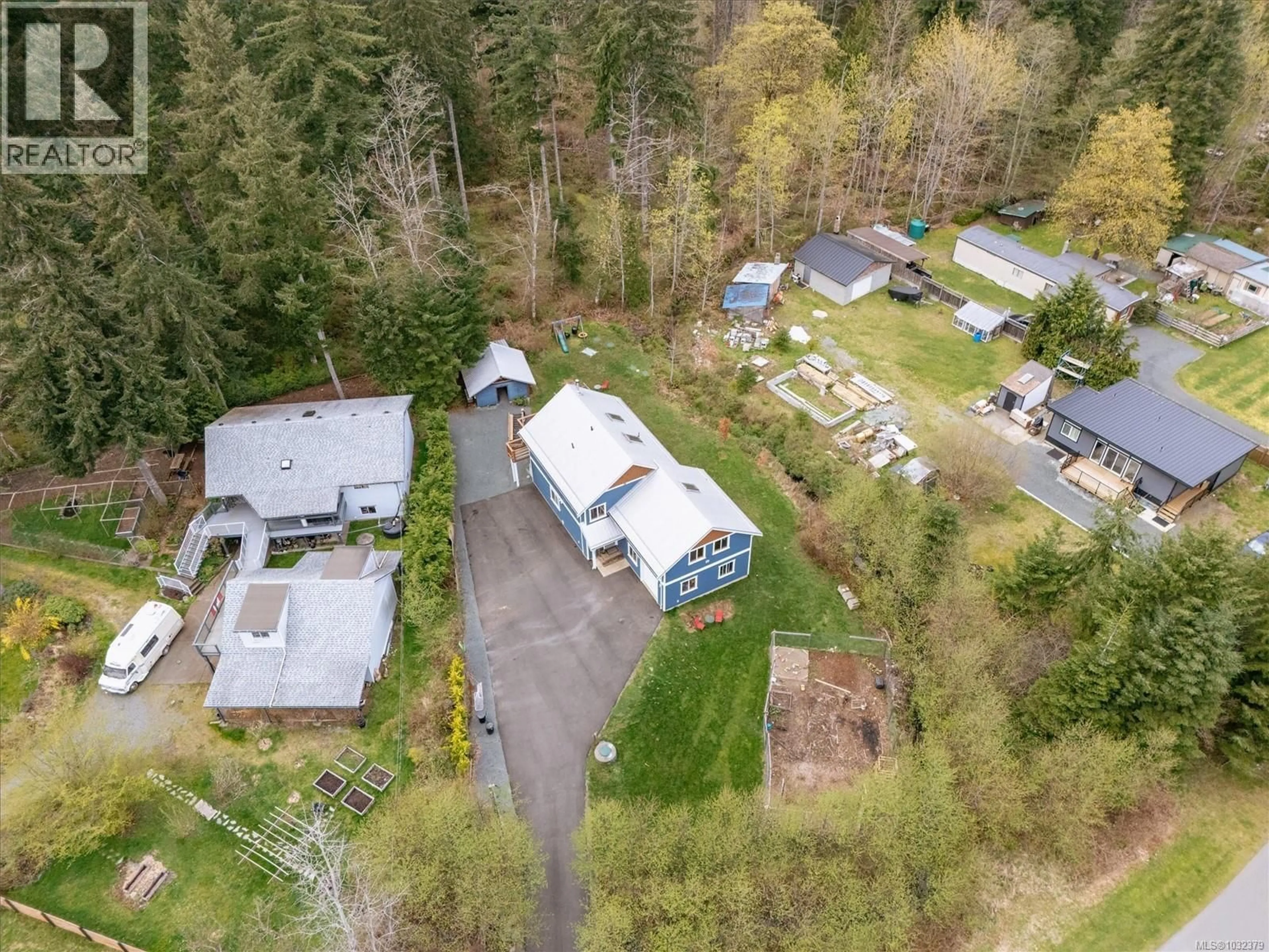 A pic from outside/outdoor area/front of a property/back of a property/a pic from drone, street for 9497 MARTIN PARK DRIVE, Black Creek British Columbia V9J1C3