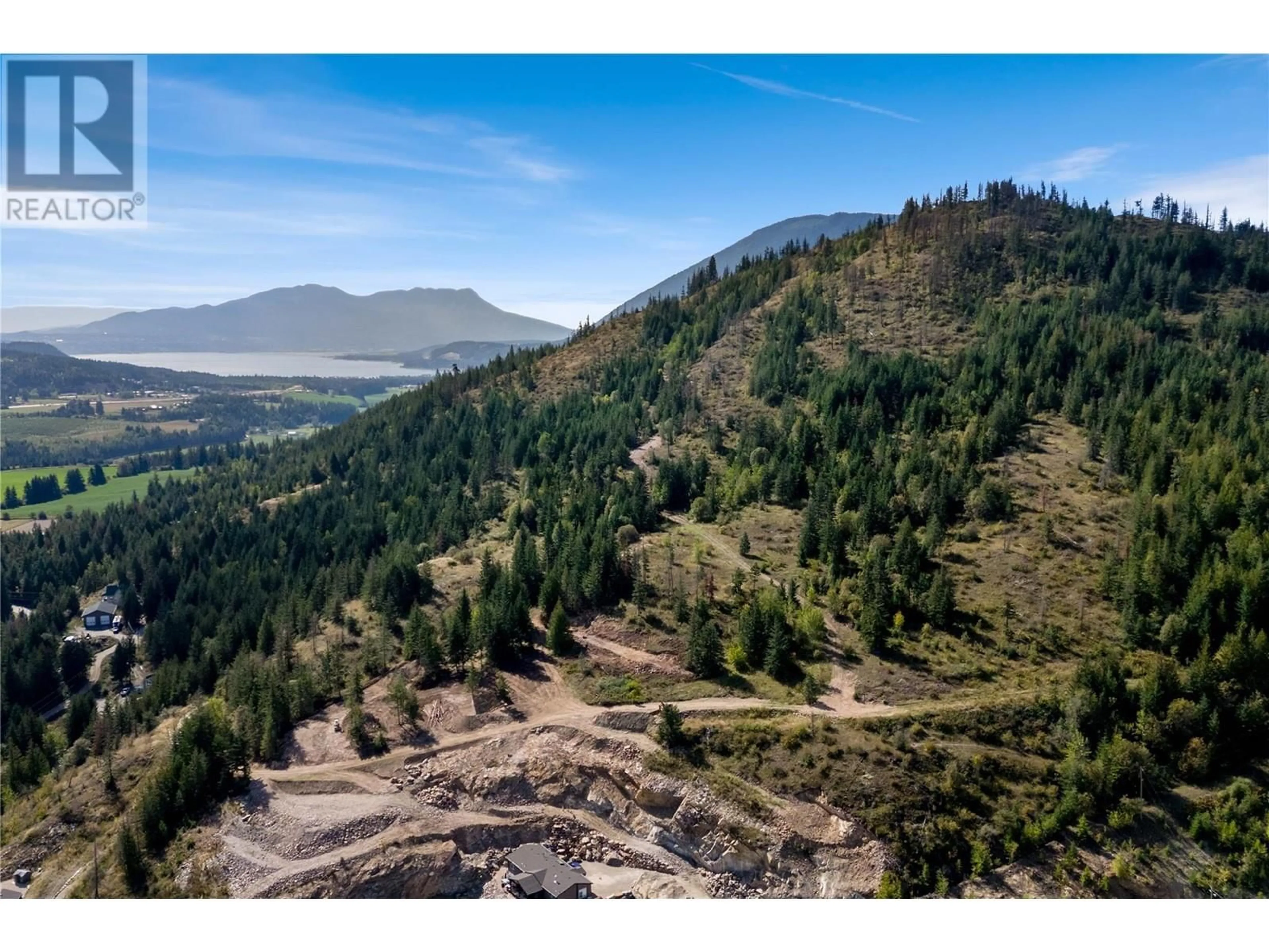 A pic from outside/outdoor area/front of a property/back of a property/a pic from drone, forest/trees view for 86 - 1885 TAPPEN NOTCH HILL ROAD, Tappen British Columbia V0E2X0
