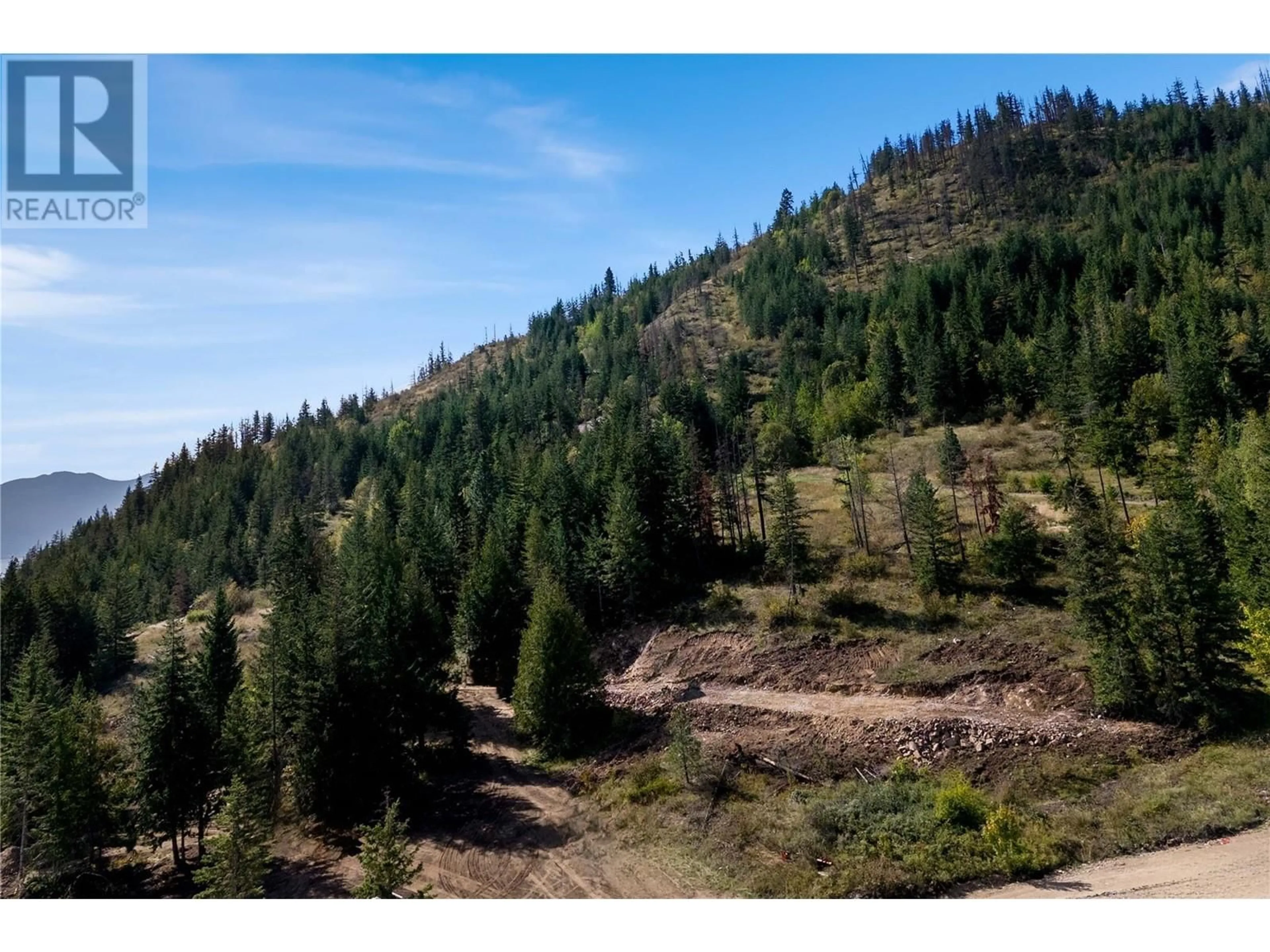 A pic from outside/outdoor area/front of a property/back of a property/a pic from drone, forest/trees view for 86 - 1885 TAPPEN NOTCH HILL ROAD, Tappen British Columbia V0E2X0