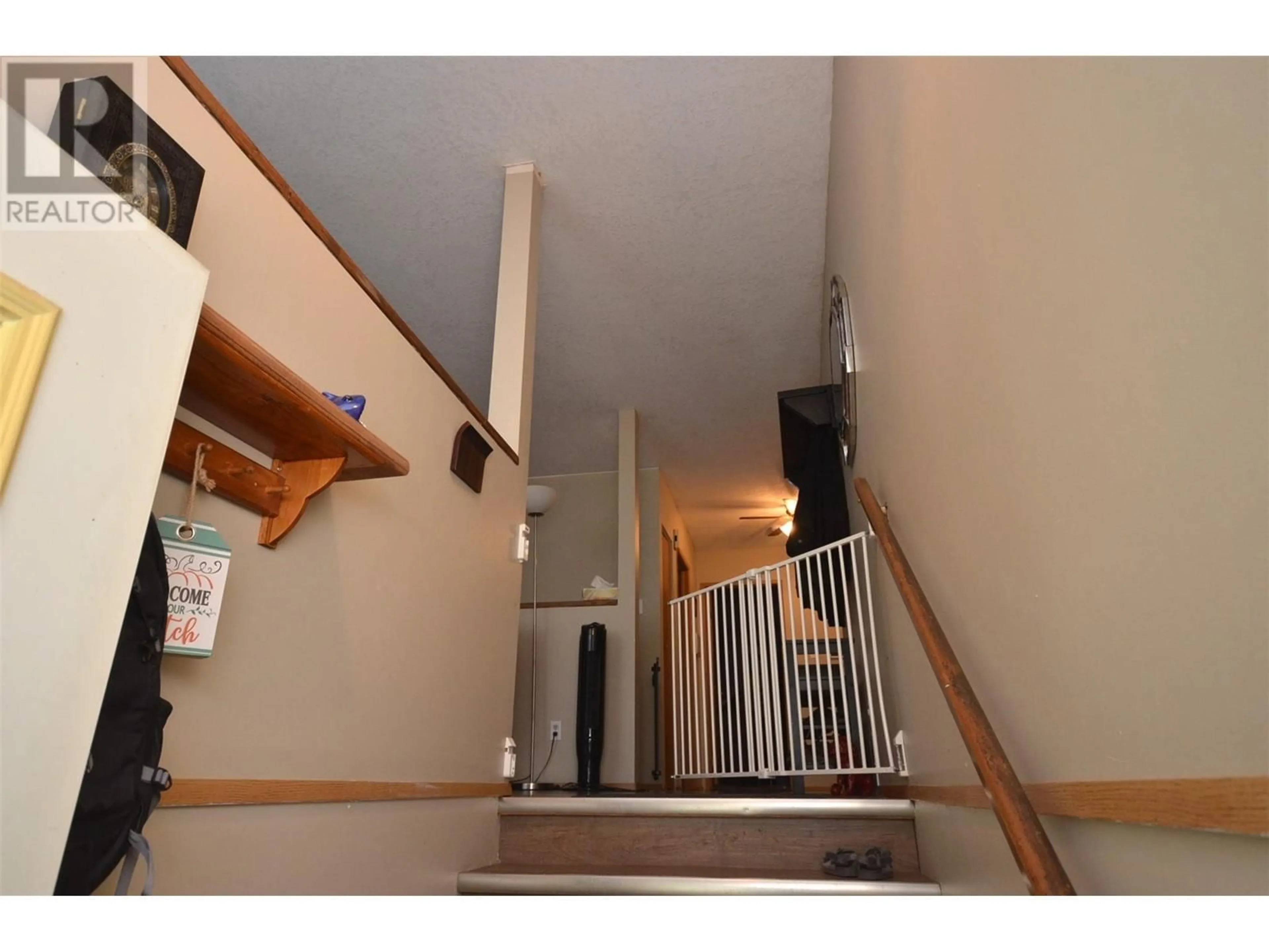 Indoor foyer, wood floors for 5787 Tuktakamin Road, Falkland British Columbia V0E1W0