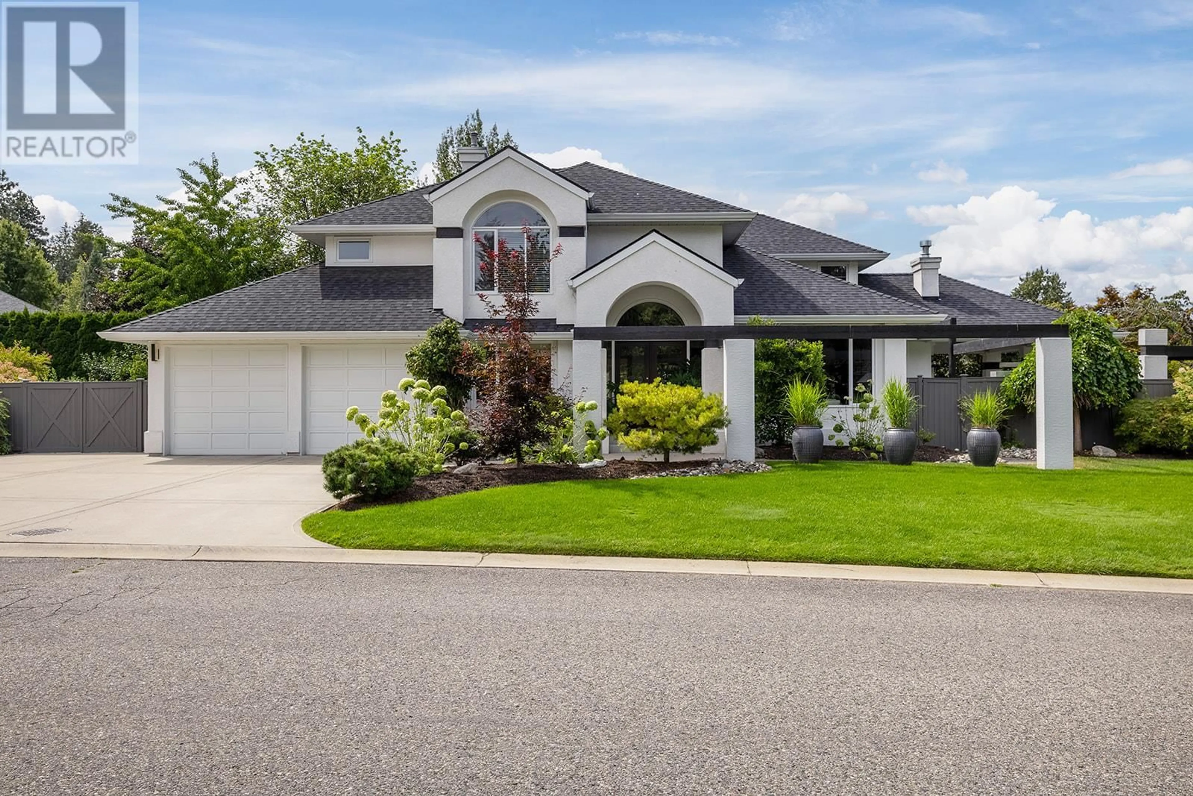 Frontside or backside of a home for 469 Carona Crescent, Kelowna British Columbia V1W3C6