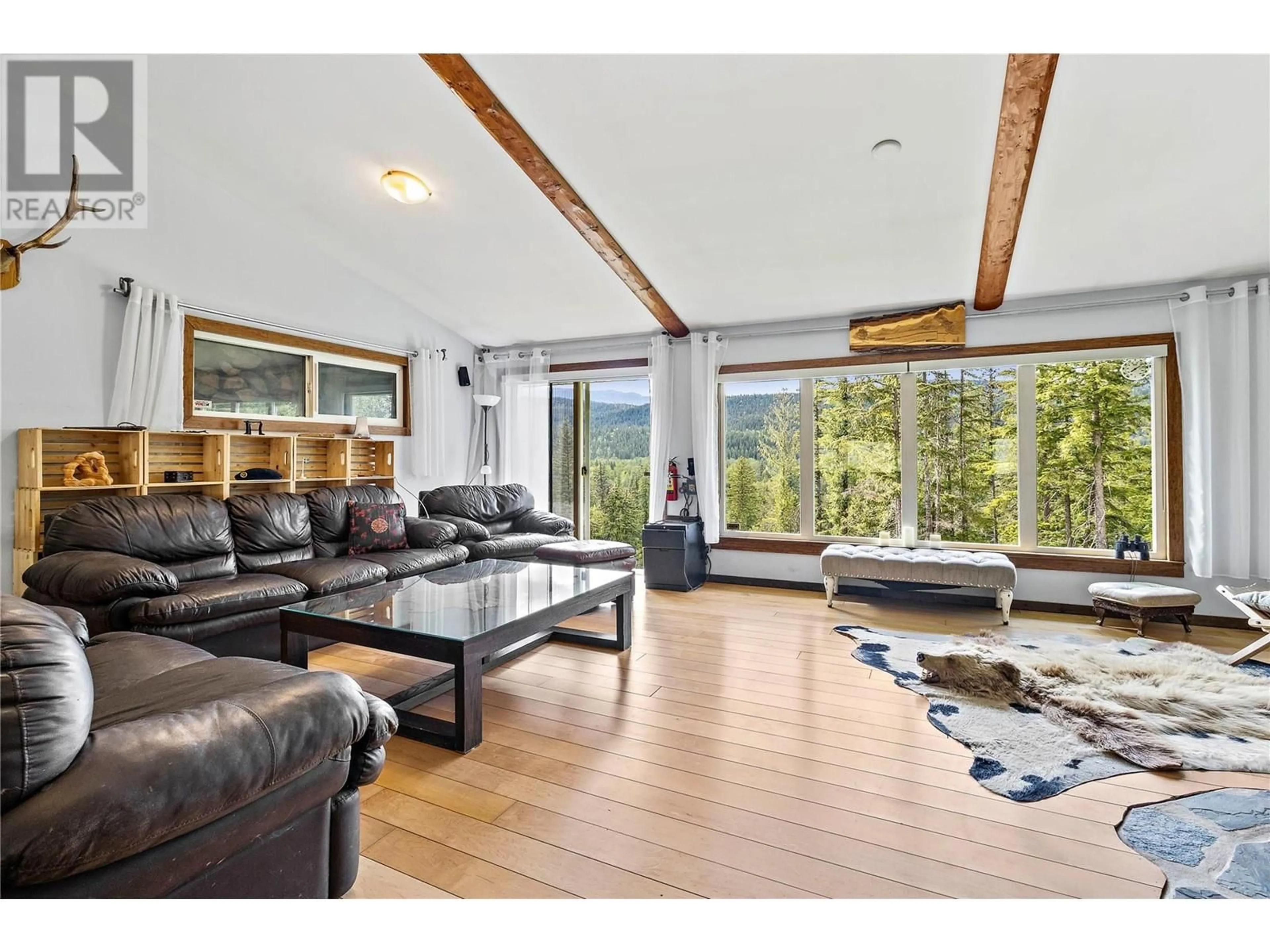 Living room, wood floors for 1446 Nittel Road, Seymour Arm British Columbia V0E1M0