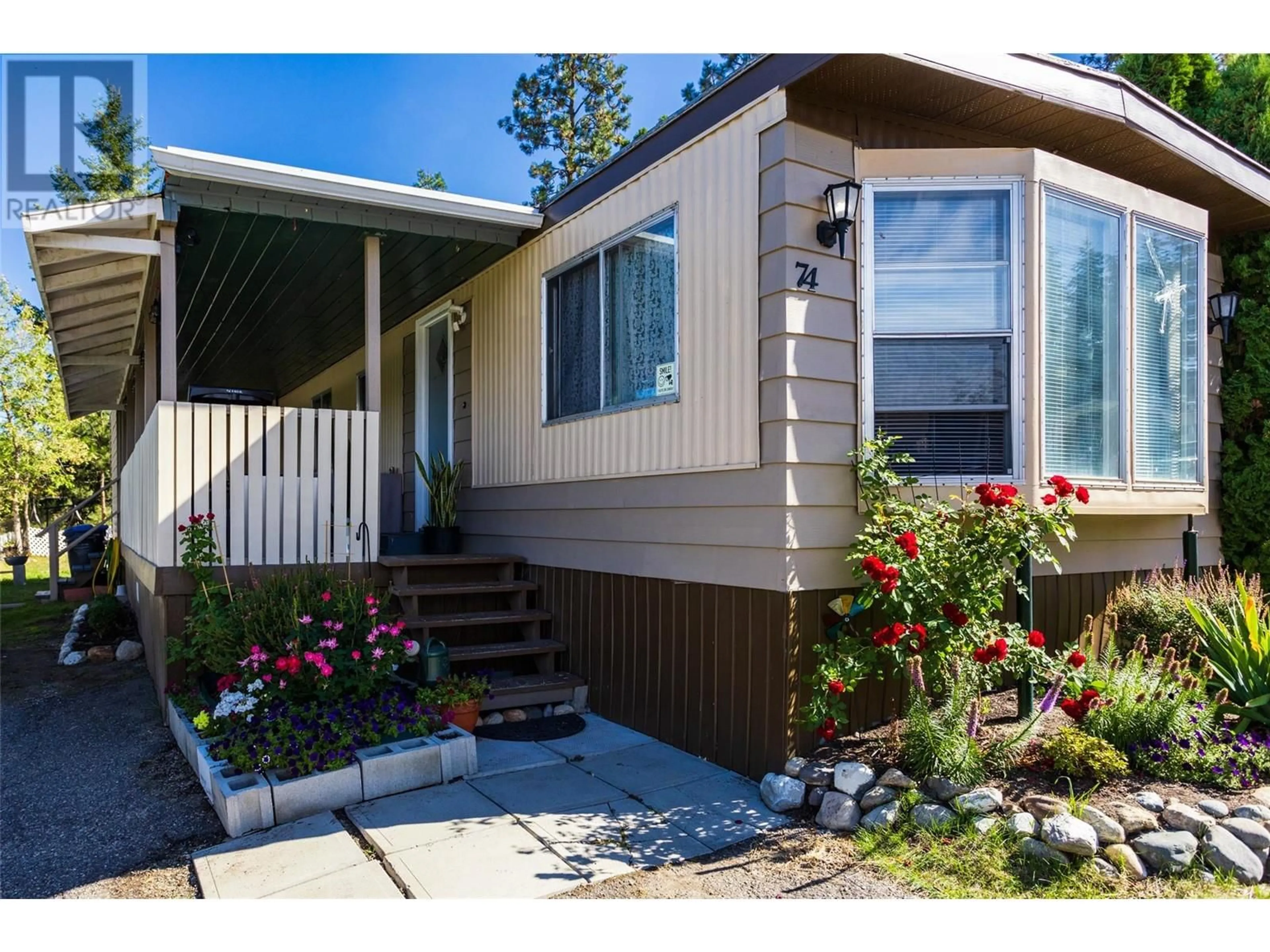 Home with vinyl exterior material for 3535 McCulloch Road Unit# 74, Kelowna British Columbia V1W4R6