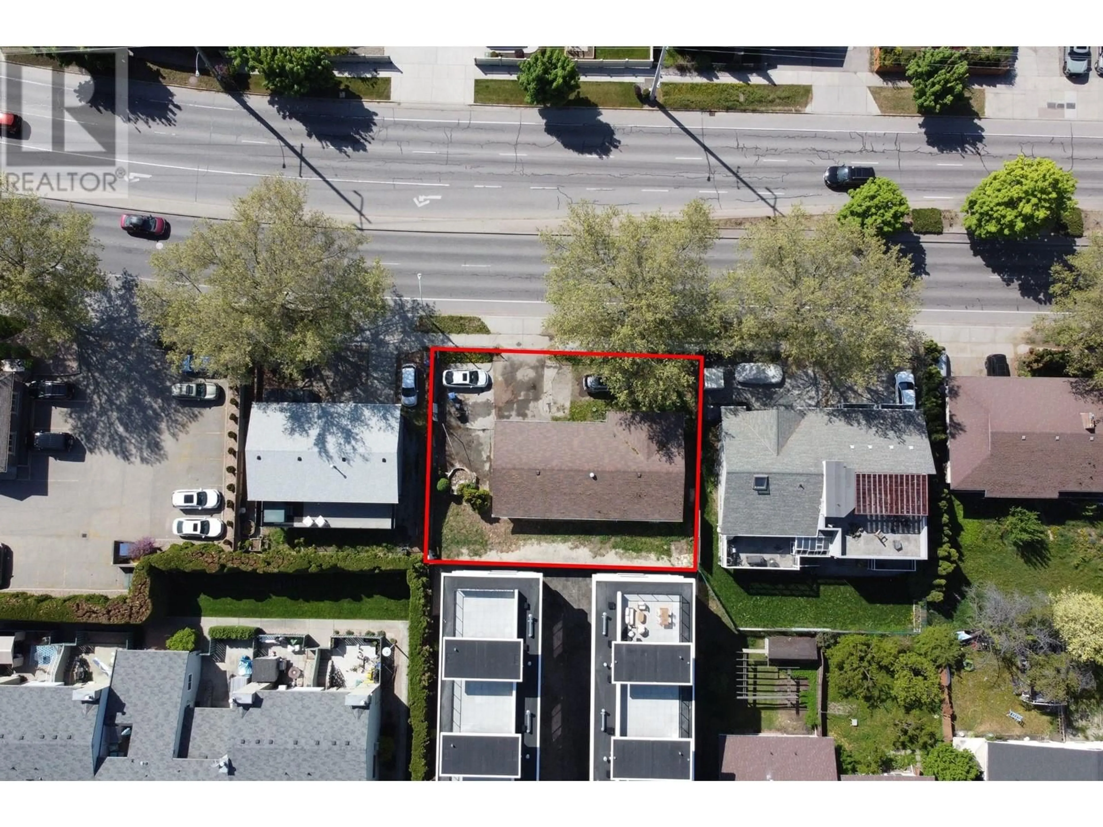 A pic from outside/outdoor area/front of a property/back of a property/a pic from drone, street for 1456 SPRINGFIELD ROAD, Kelowna British Columbia V1Y5V3