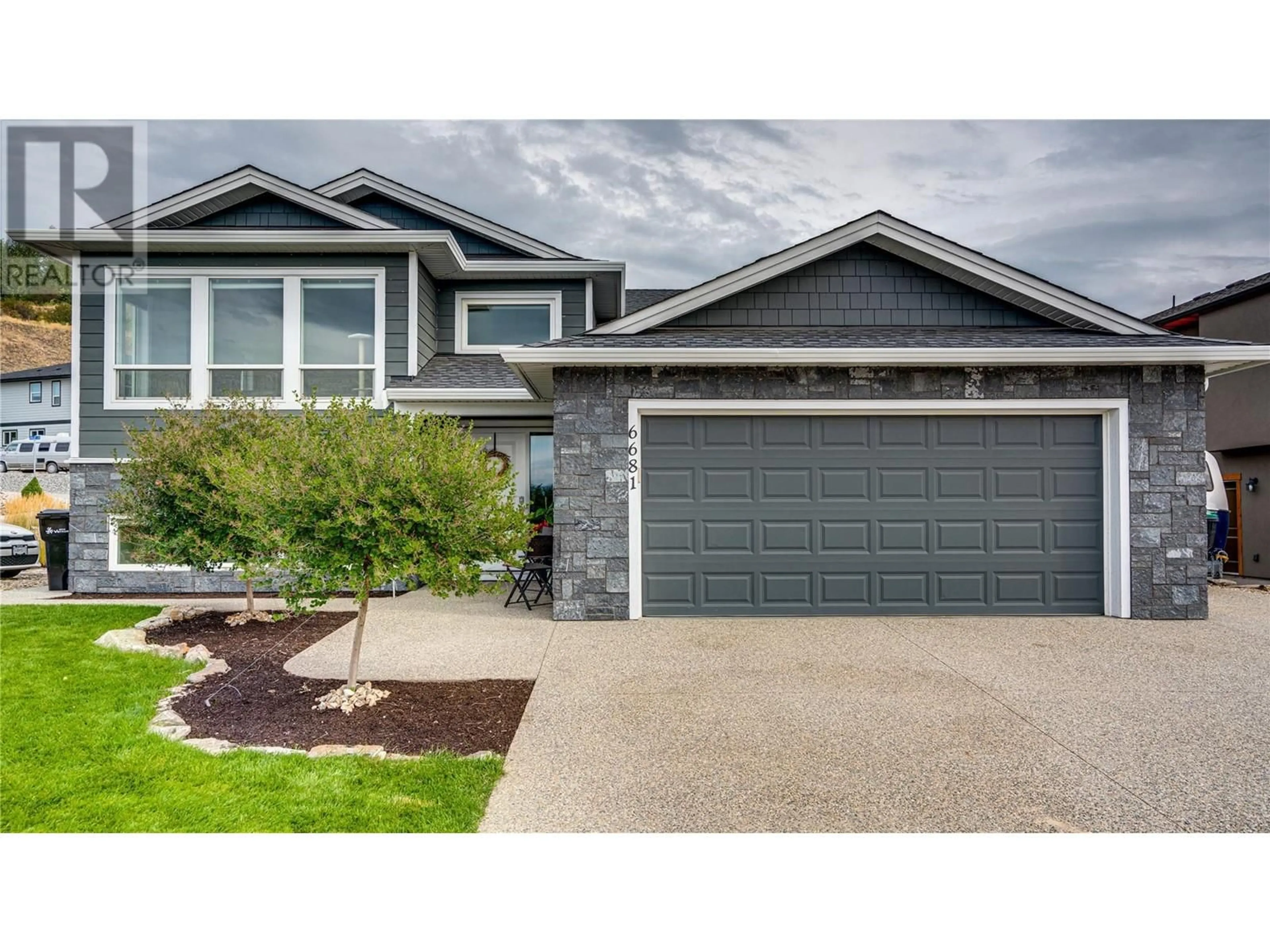 Home with vinyl exterior material for 6681 Blackcomb Way, Vernon British Columbia V1B0A3