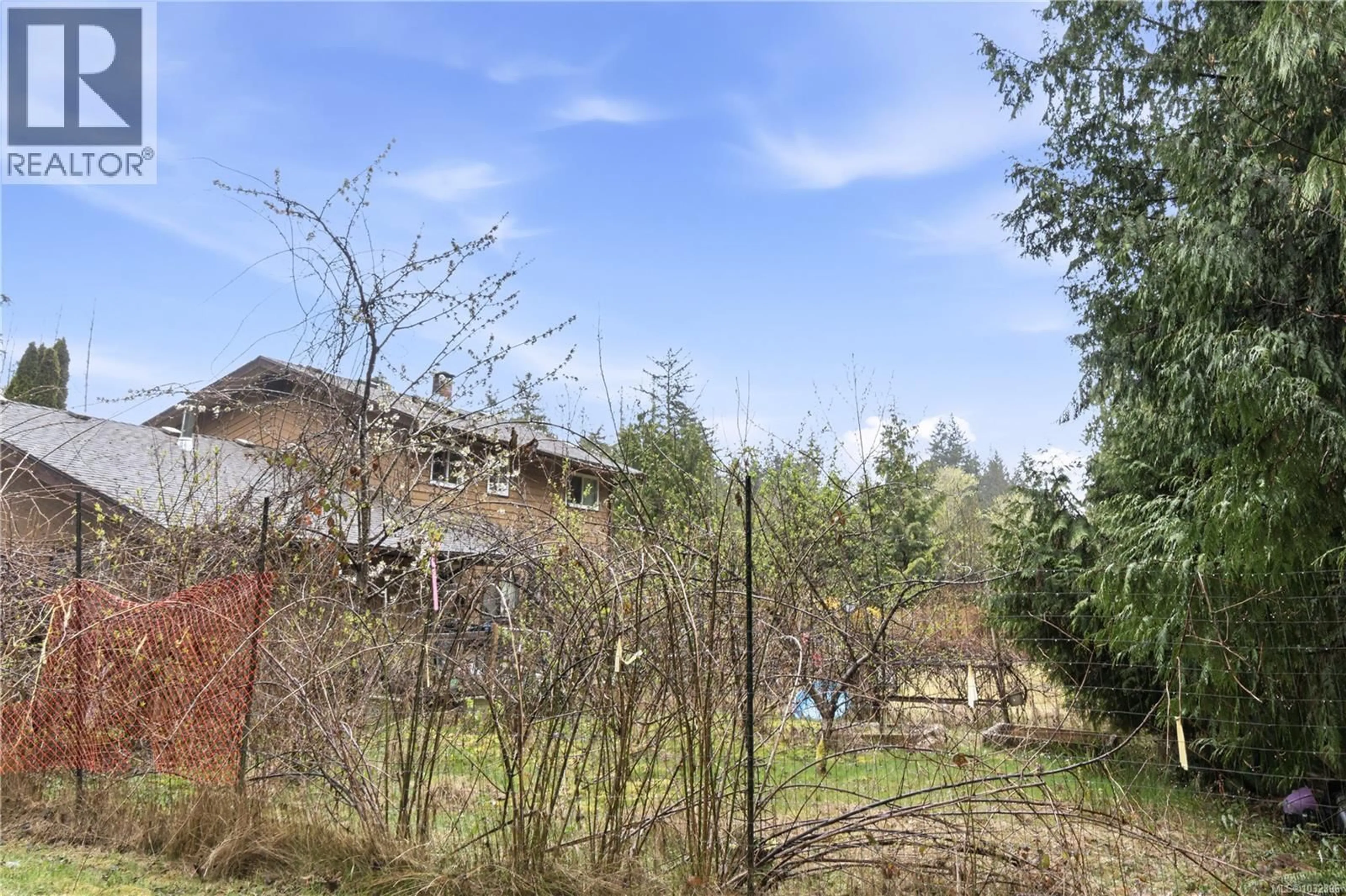 A pic from outside/outdoor area/front of a property/back of a property/a pic from drone, forest/trees view for 4080 ISLAND HIGHWAY, Qualicum Beach British Columbia V9K2B1
