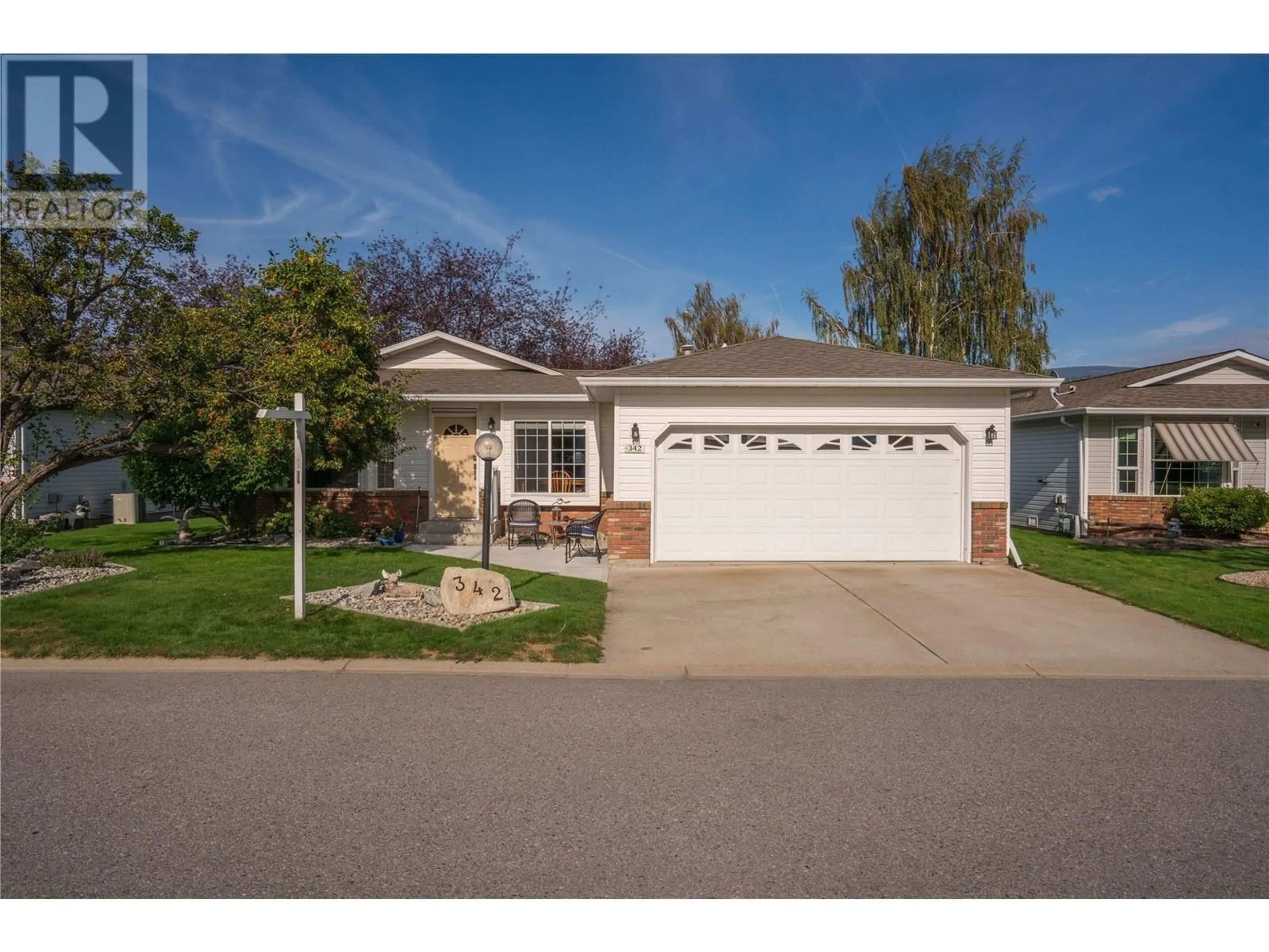 Home with vinyl exterior material, street for 342 FALCON DRIVE, Penticton British Columbia V2A8K6