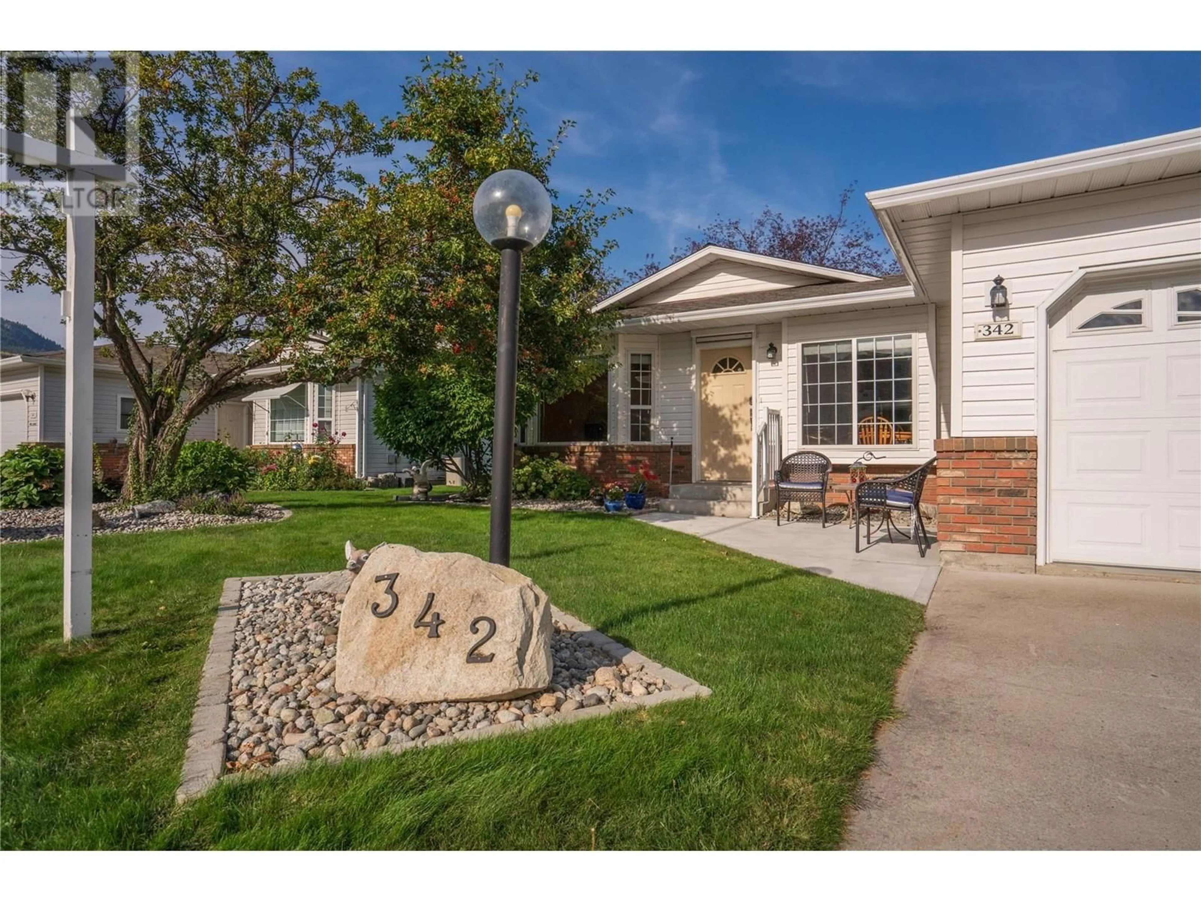 Home with brick exterior material, street for 342 FALCON DRIVE, Penticton British Columbia V2A8K6