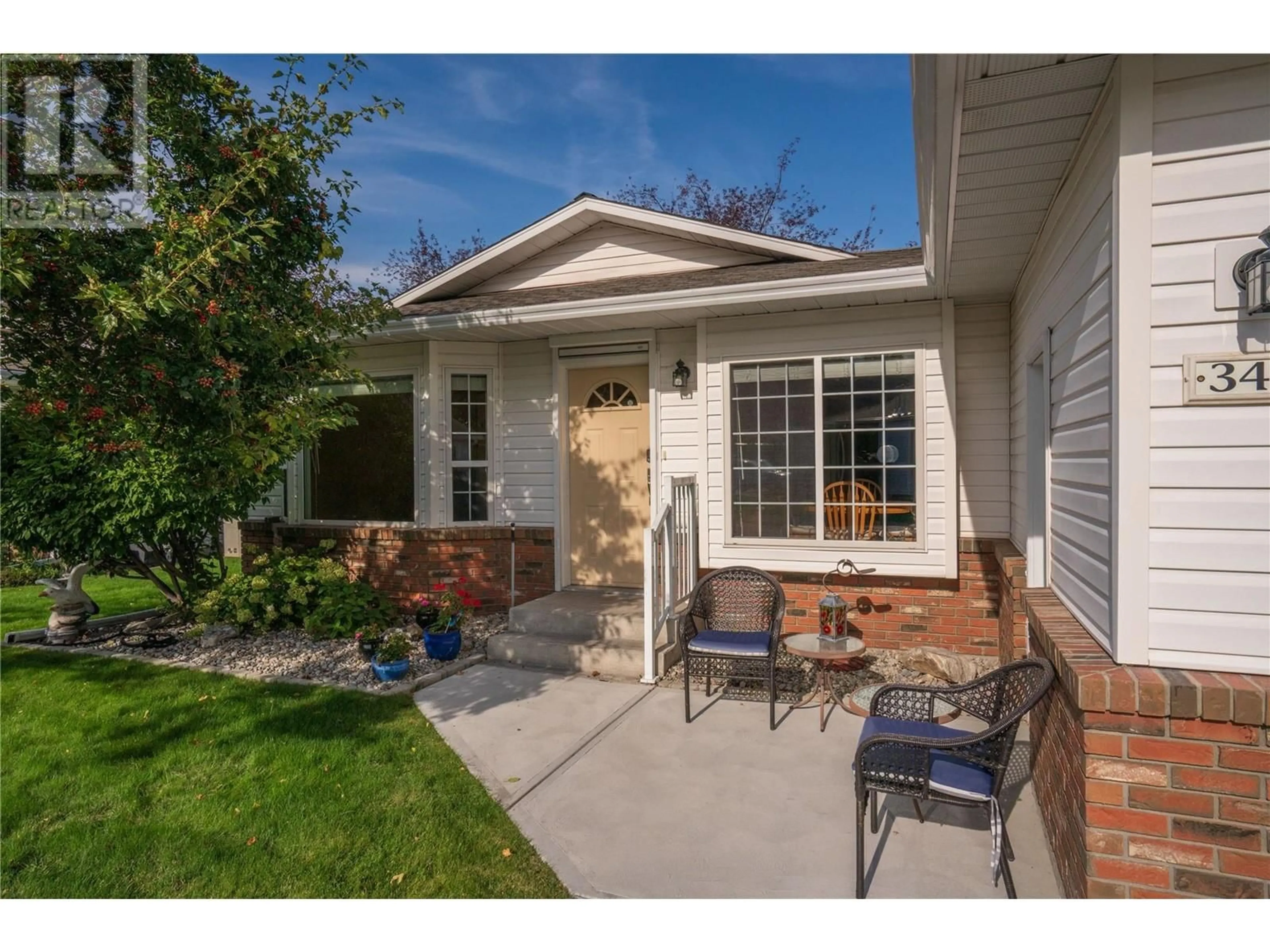 Home with brick exterior material, street for 342 FALCON DRIVE, Penticton British Columbia V2A8K6