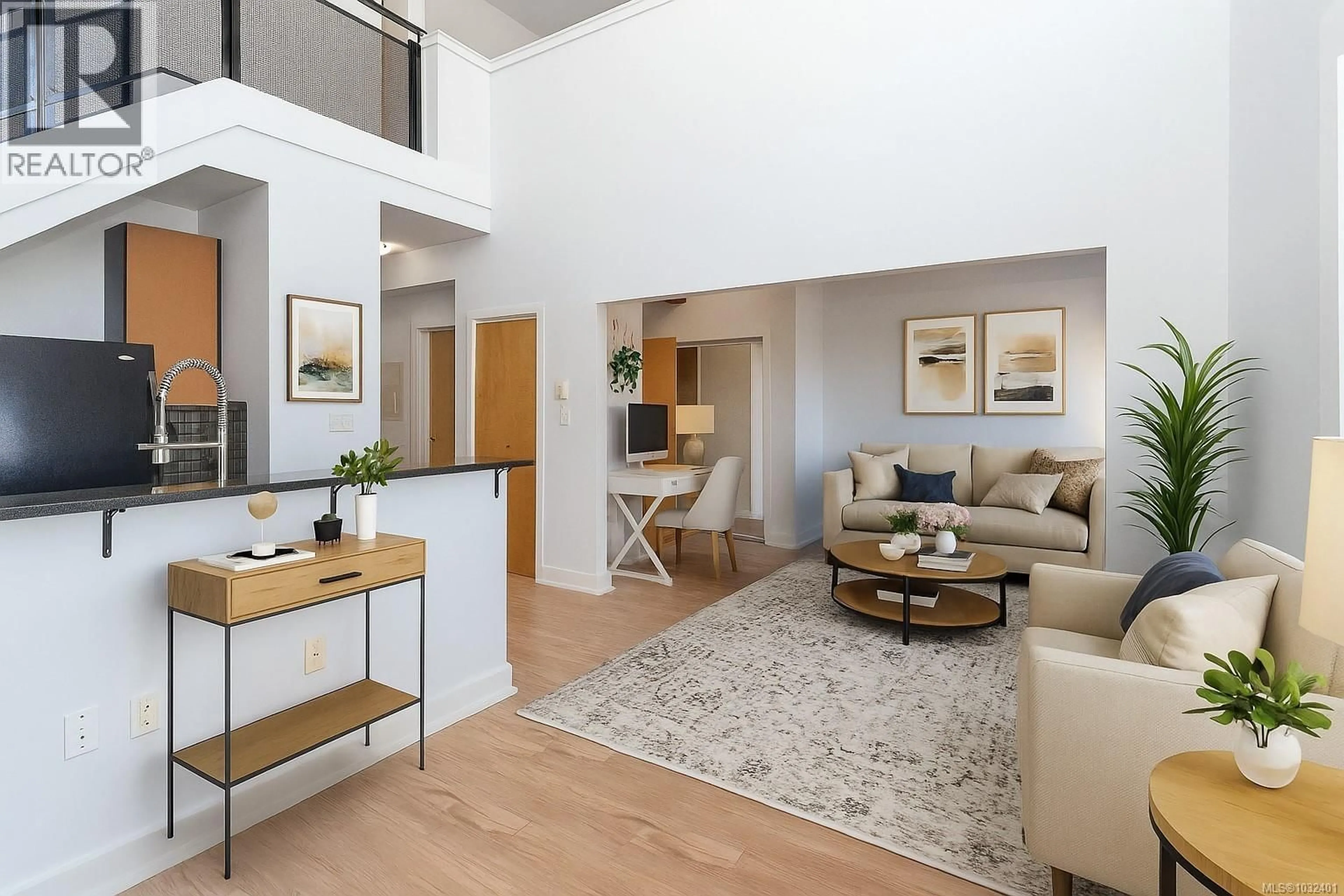 Living room with furniture, wood/laminate floor for 323 - 599 PANDORA AVENUE, Victoria British Columbia V8W1N5