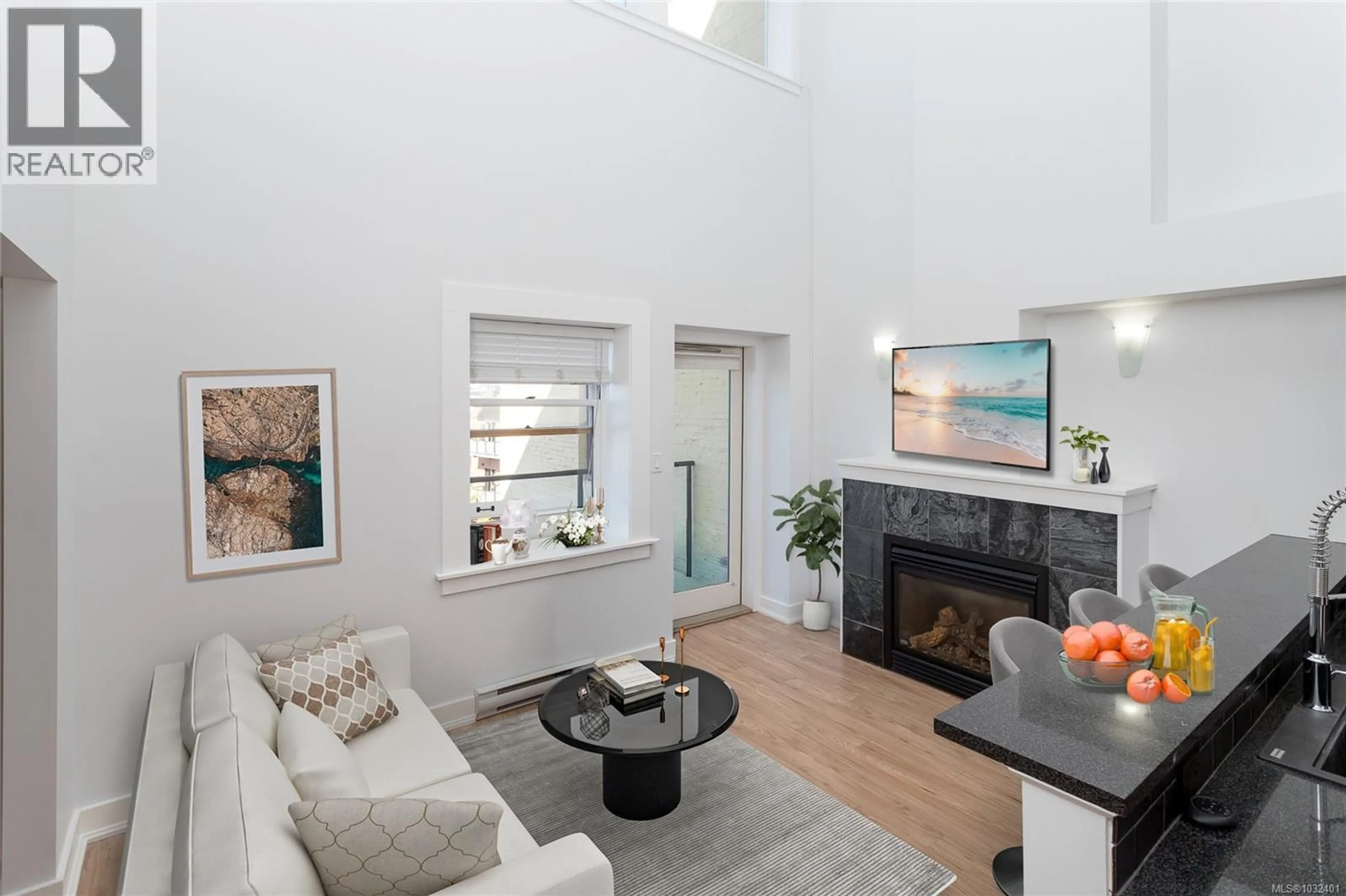 Living room with furniture, unknown for 323 - 599 PANDORA AVENUE, Victoria British Columbia V8W1N5