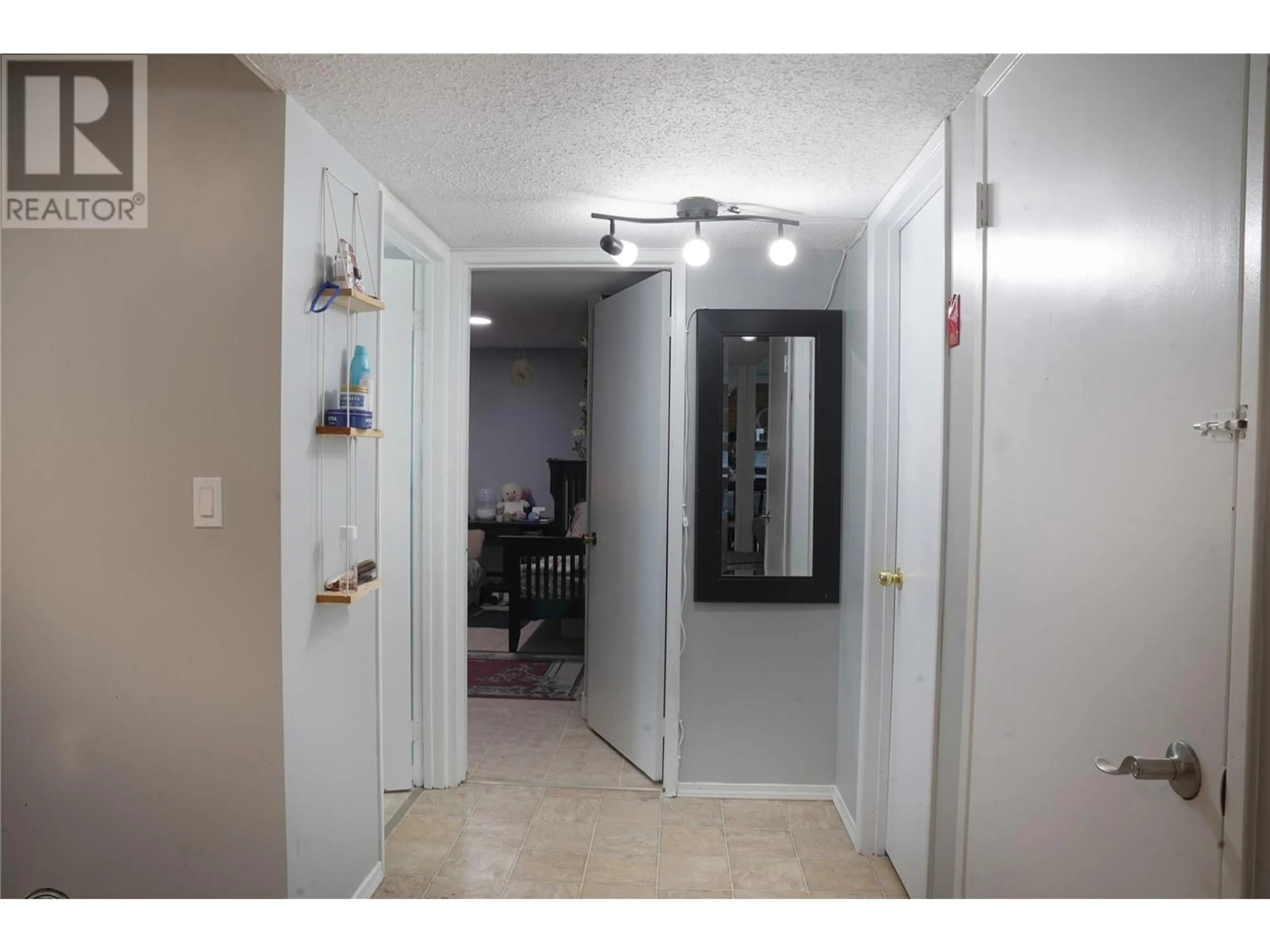 Indoor foyer, not visible floor for 305 Ziprick Road, Kelowna British Columbia V1X4H2