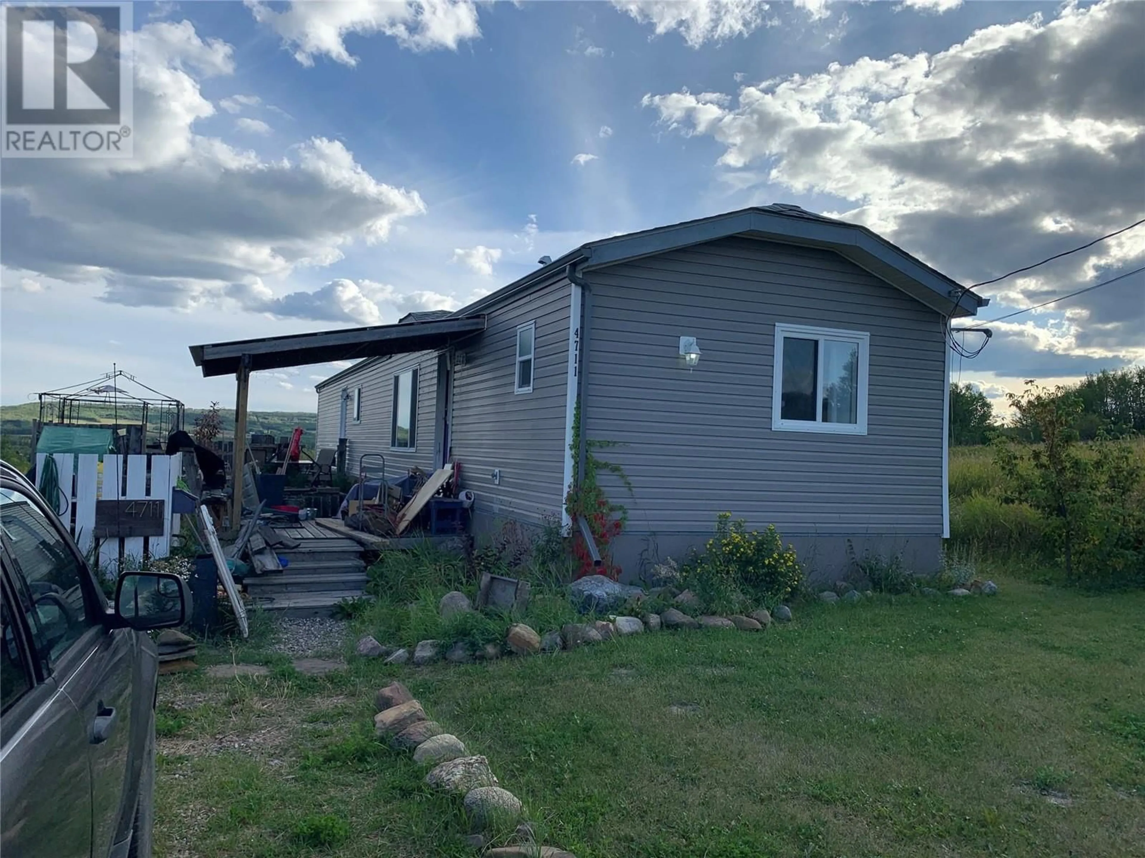 Frontside or backside of a home, cottage for 4711 56 Avenue, Dawson Creek British Columbia V0C2C0