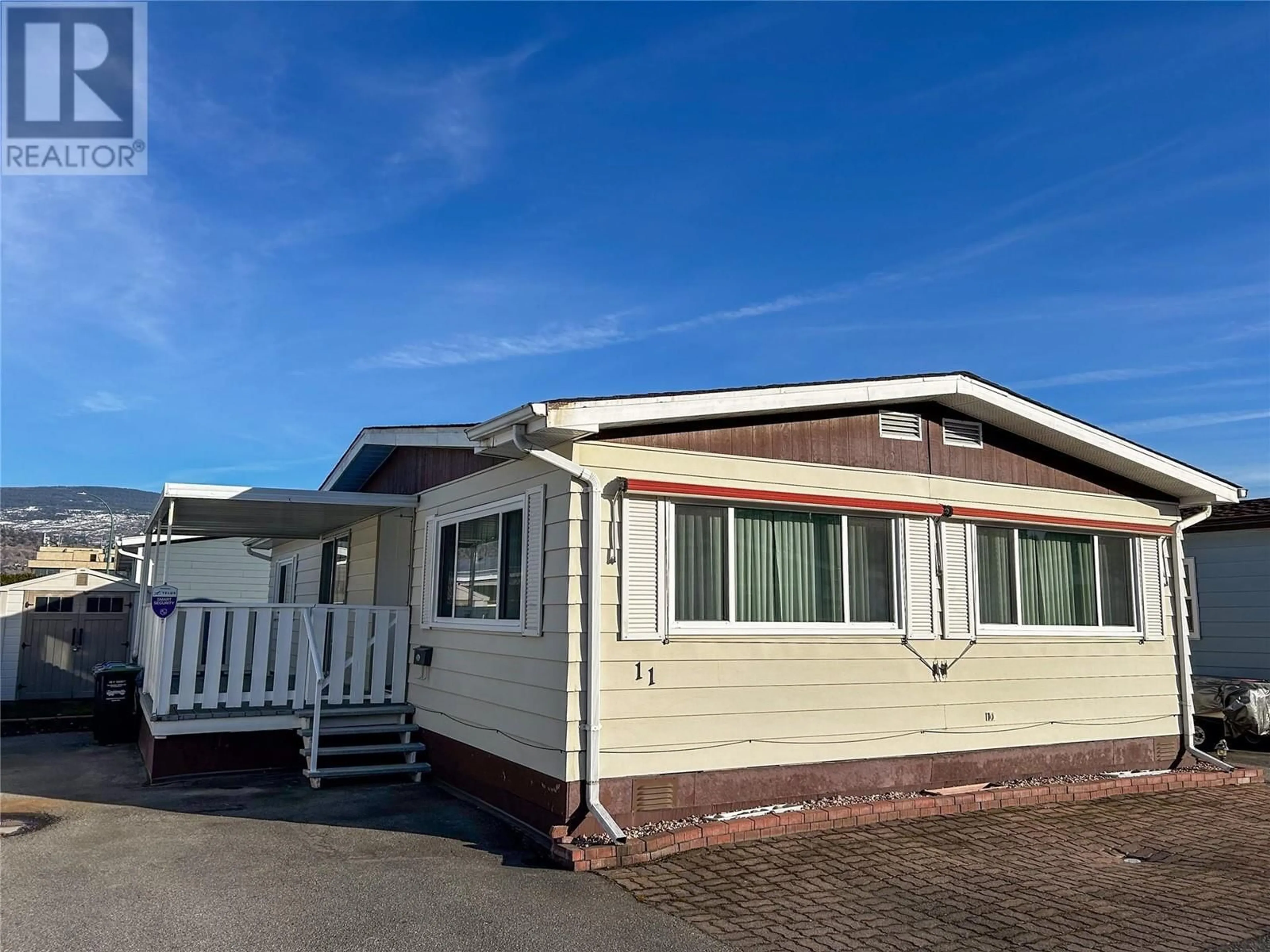Home with vinyl exterior material, street for 11 - 999 BURNABY AVENUE, Penticton British Columbia V2A1G7