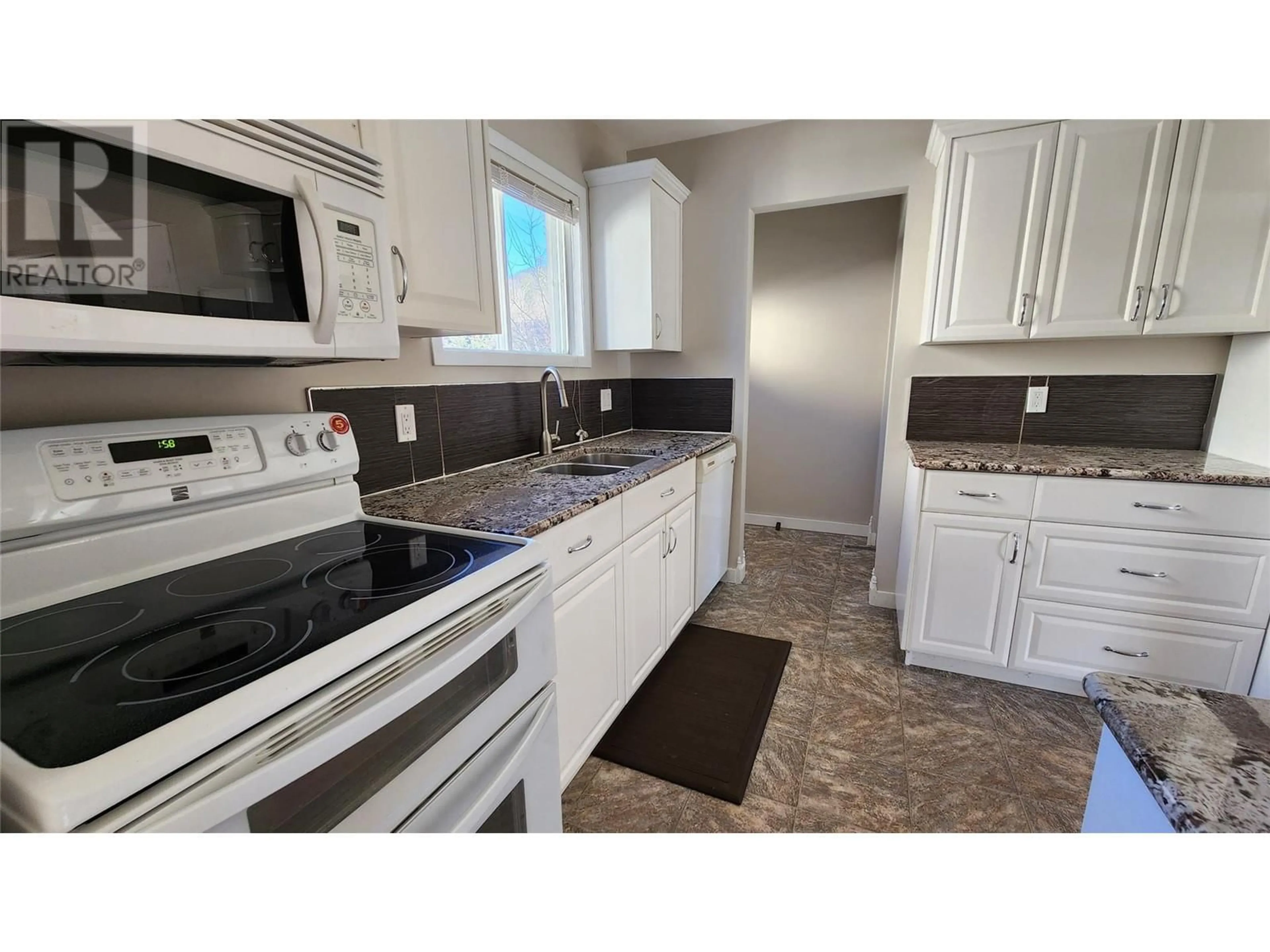 Standard kitchen, wood floors, cottage for 128 RED WILLOW Avenue, Tumbler Ridge British Columbia V0C2W0