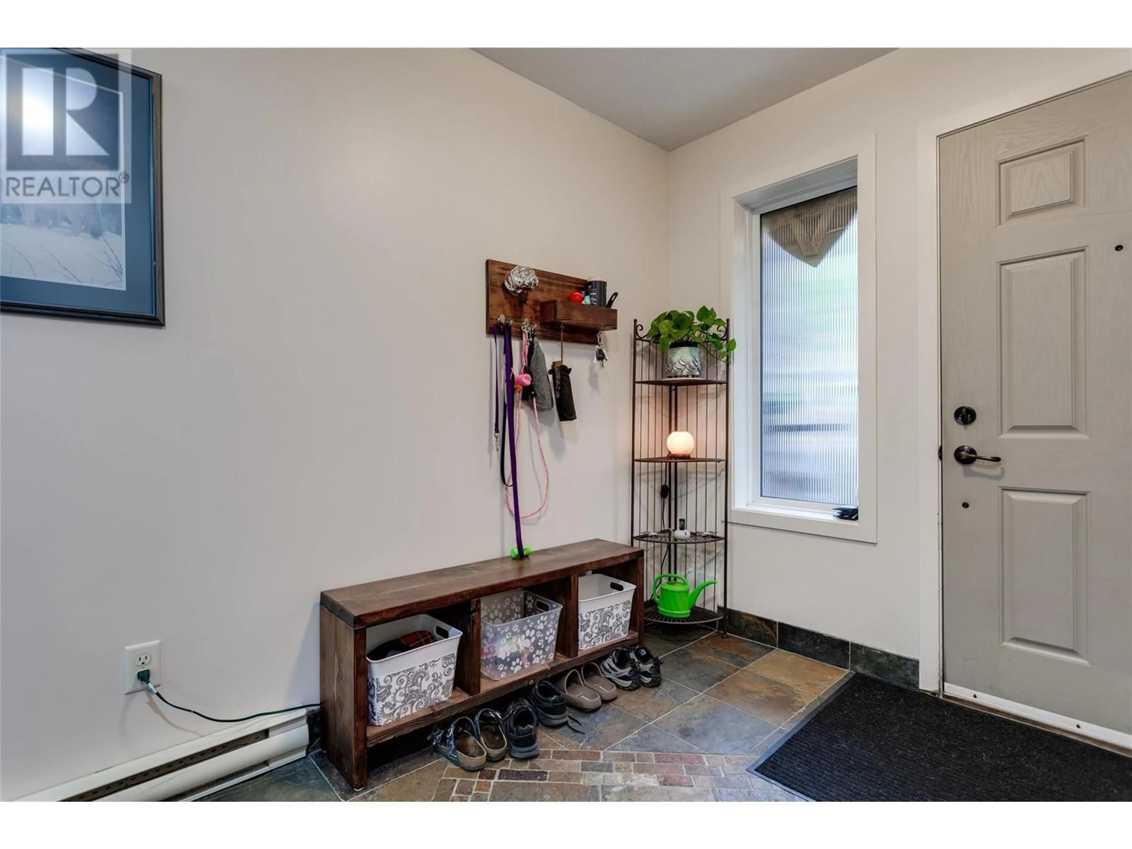 Indoor entryway, wood floors for 150 Mallach Road Unit# 204, Kelowna British Columbia V1X2W5