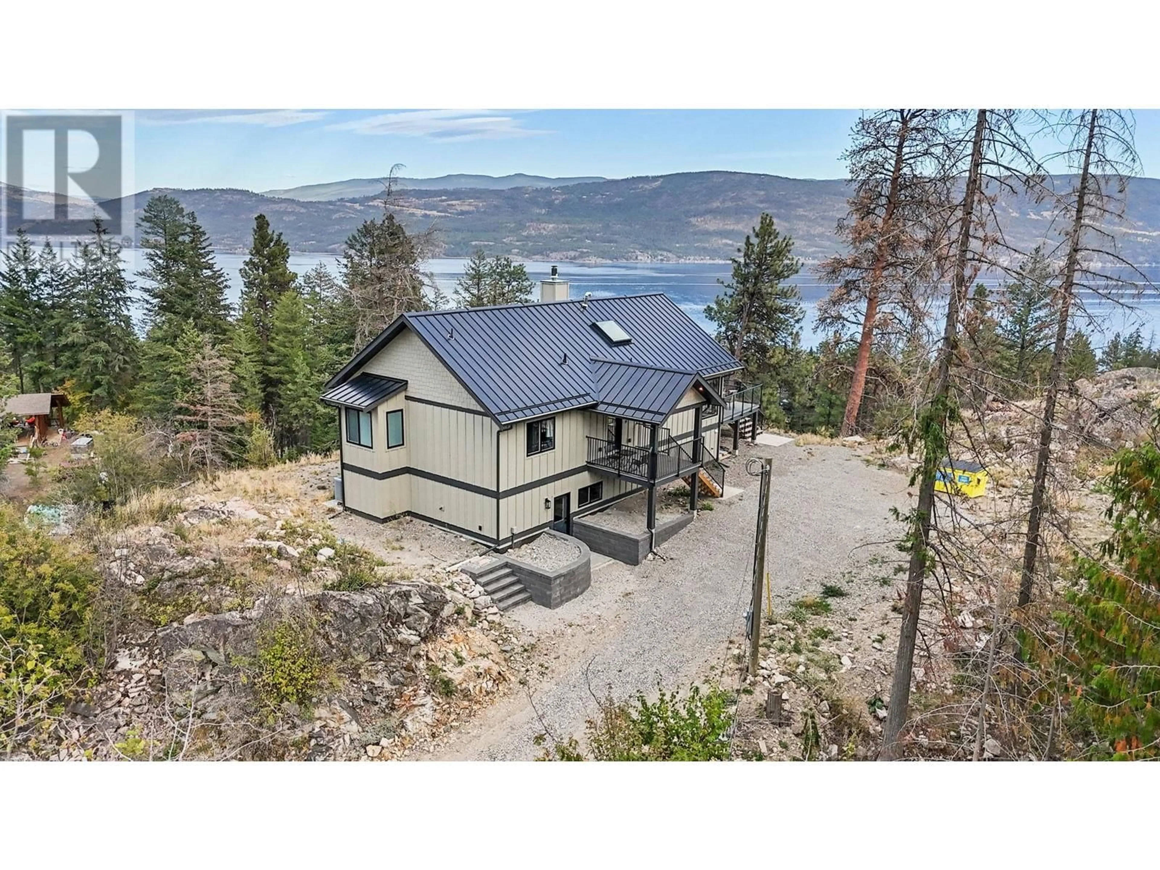 A pic from outside/outdoor area/front of a property/back of a property/a pic from drone, water/lake/river/ocean view for 591 MOODY CRESCENT, Vernon British Columbia V1H2C8