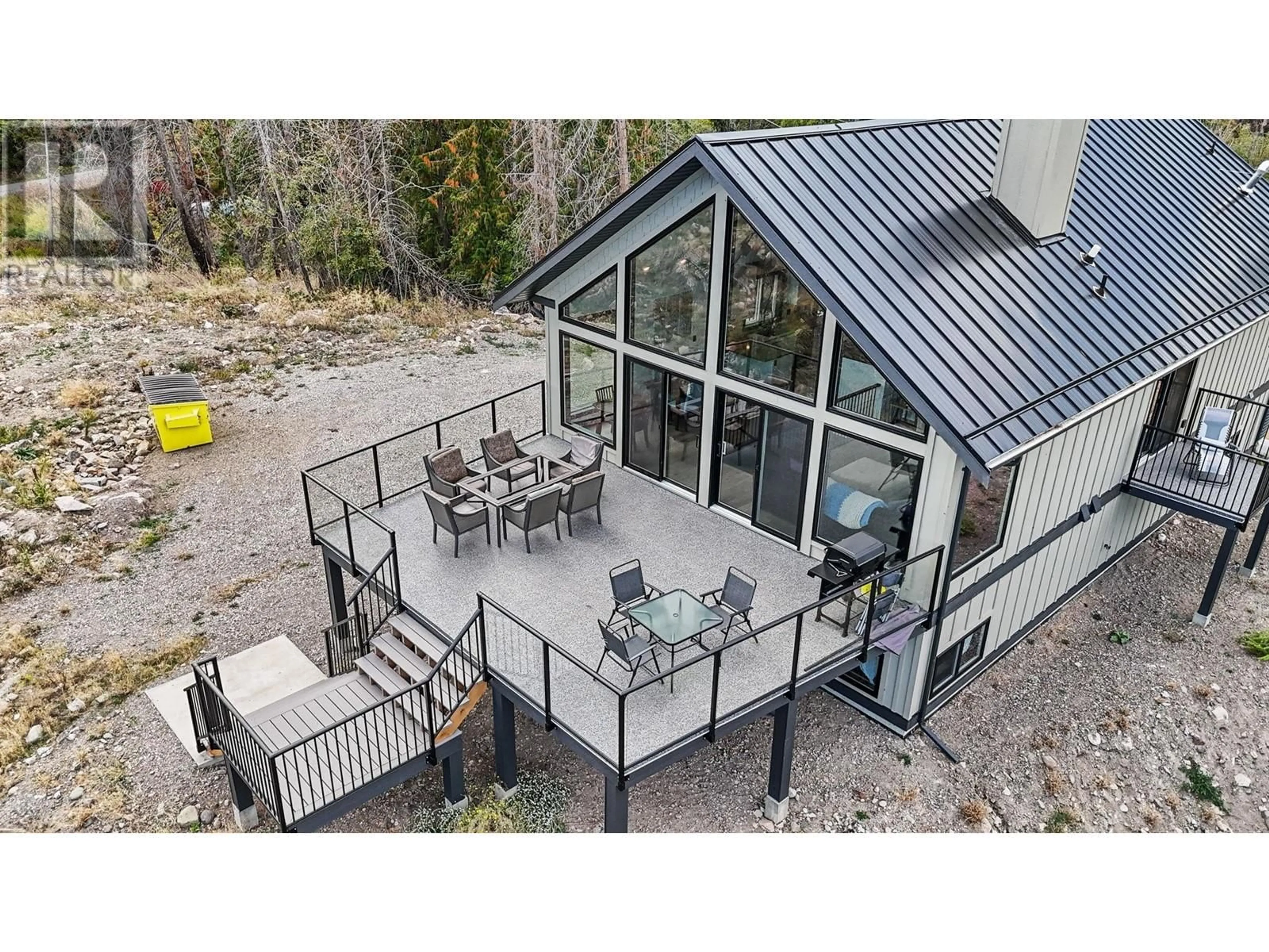 A pic from outside/outdoor area/front of a property/back of a property/a pic from drone, mountain view for 591 MOODY CRESCENT, Vernon British Columbia V1H2C8