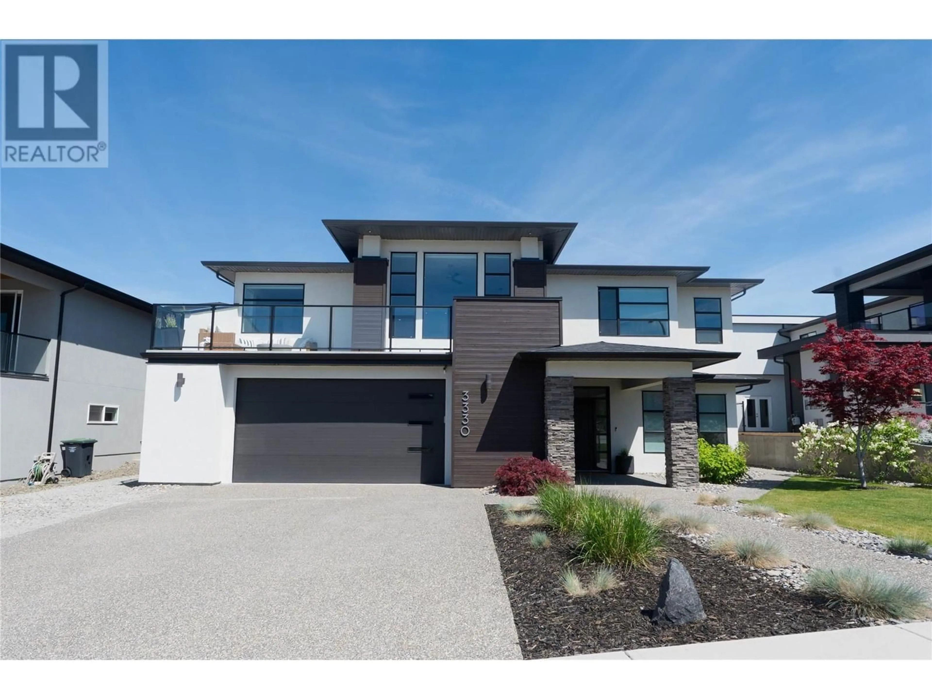 Frontside or backside of a home, the street view for 3330 Vineyard View Drive, West Kelowna British Columbia V4T3M3