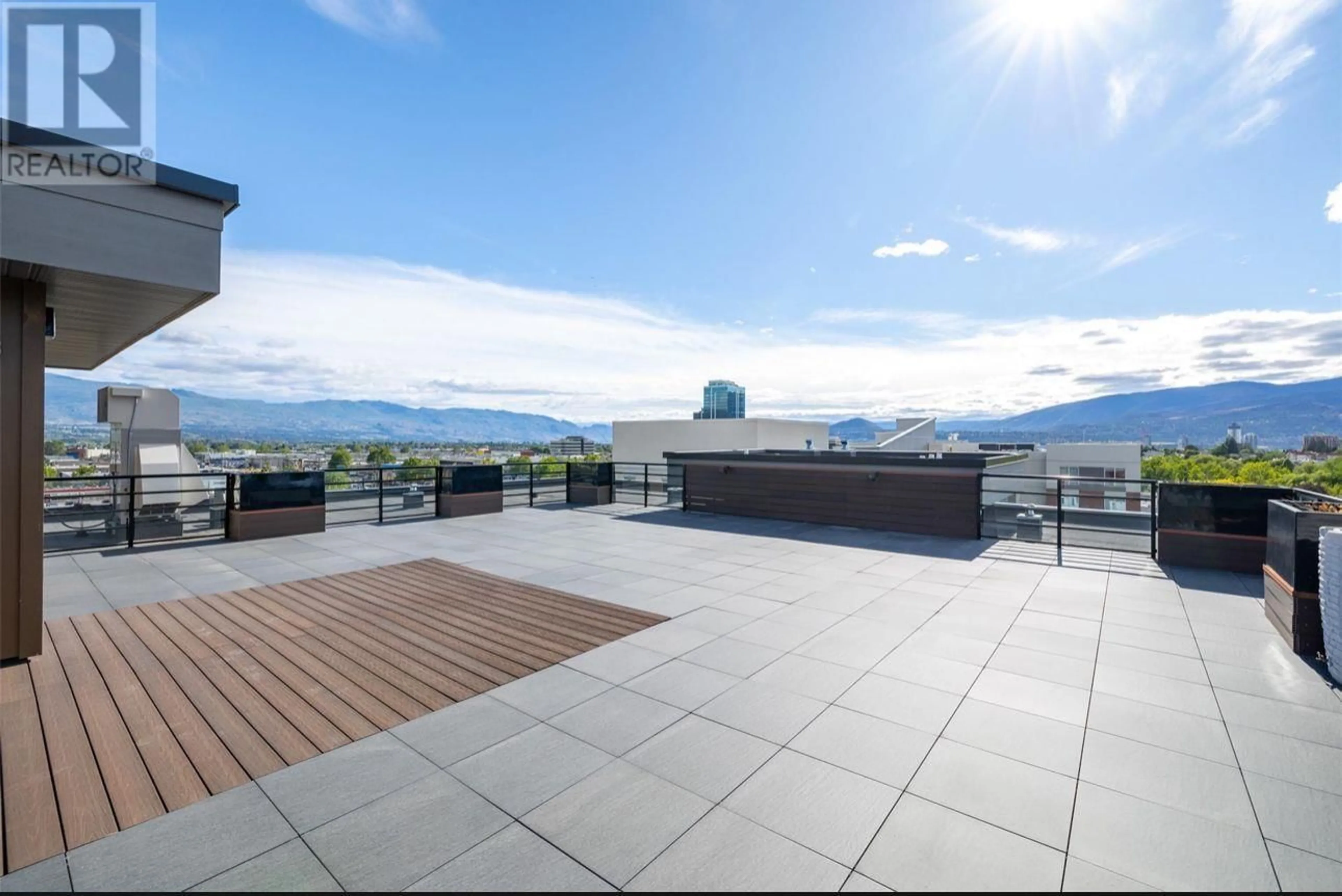 Patio, the view of mountain for 1925 Enterprise Way Unit# 305, Kelowna British Columbia V1Y9S9