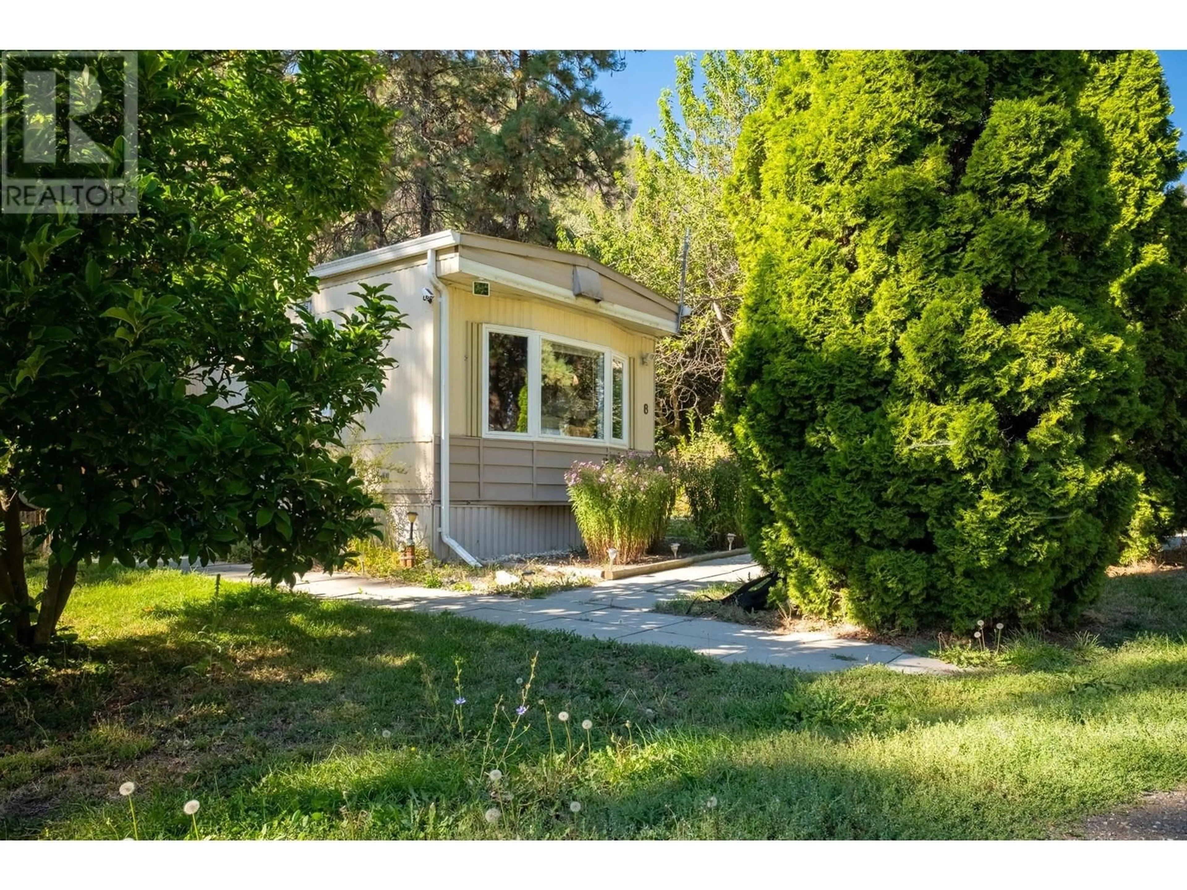 Frontside or backside of a home, cottage for 12069 Westside Road Unit# 8, Vernon British Columbia V1H2A5