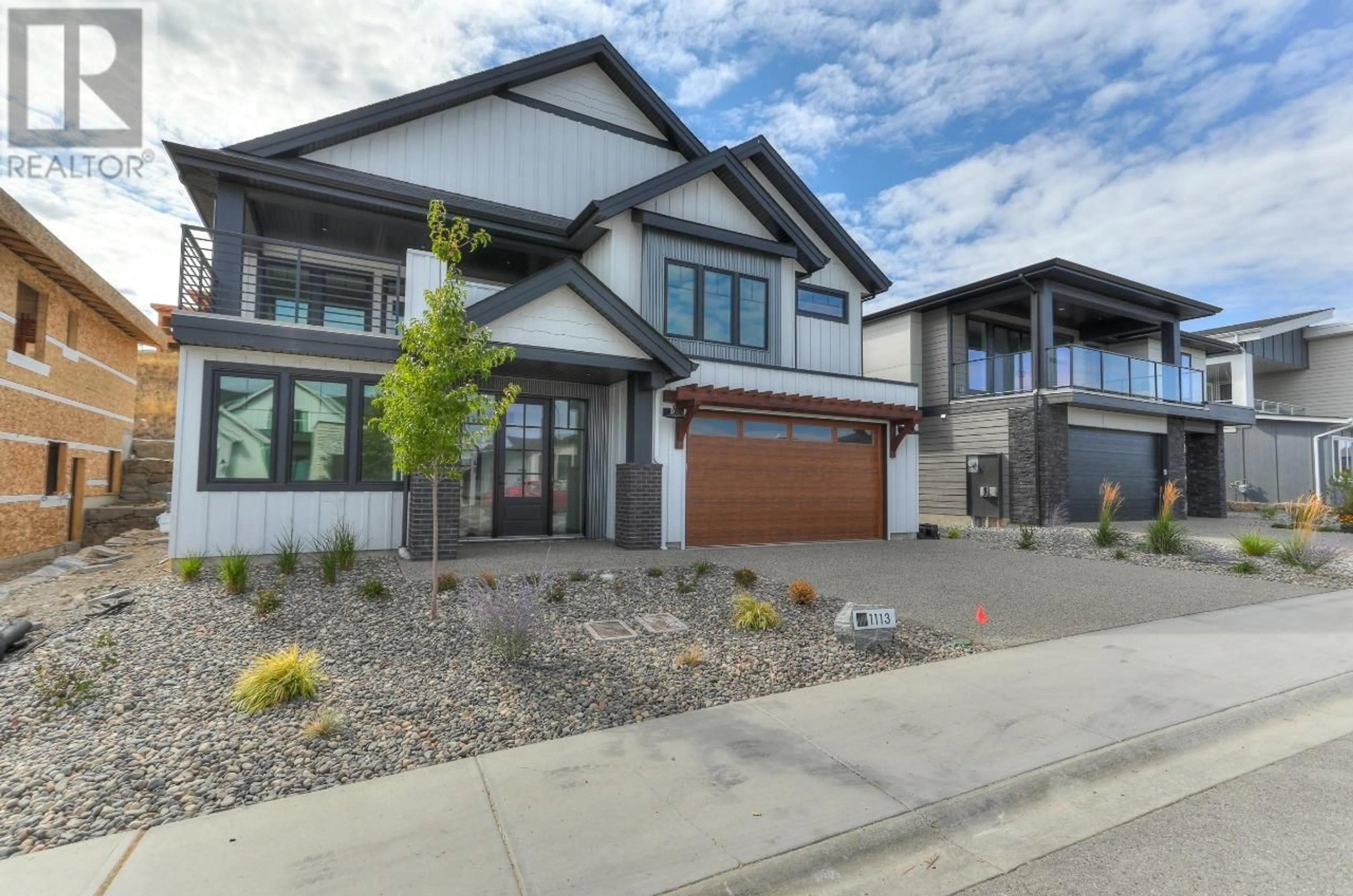 Frontside or backside of a home, the street view for 1113 Collinson Court, Kelowna British Columbia V1W0C3