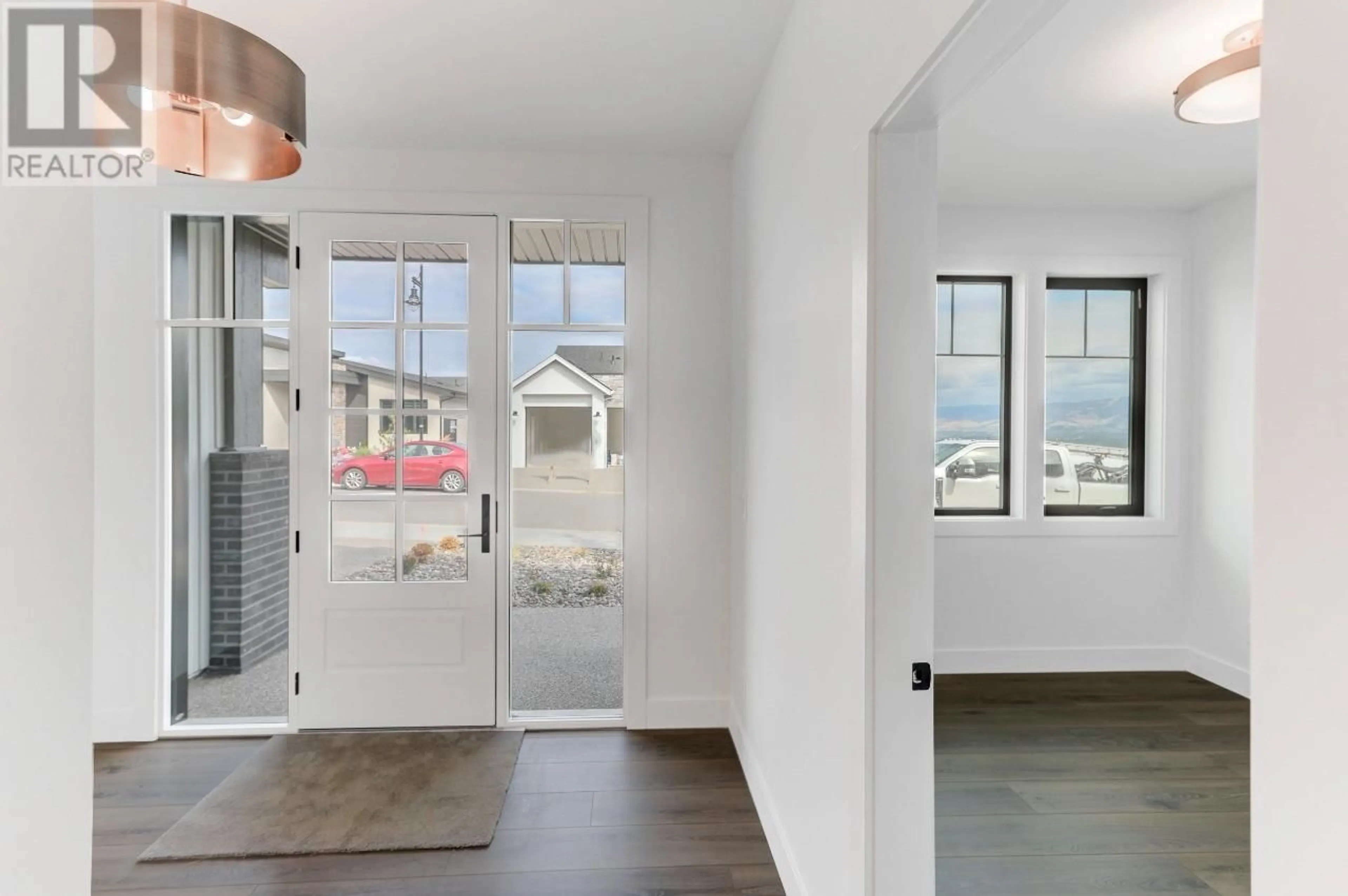 Indoor entryway, wood floors for 1113 Collinson Court, Kelowna British Columbia V1W0C3