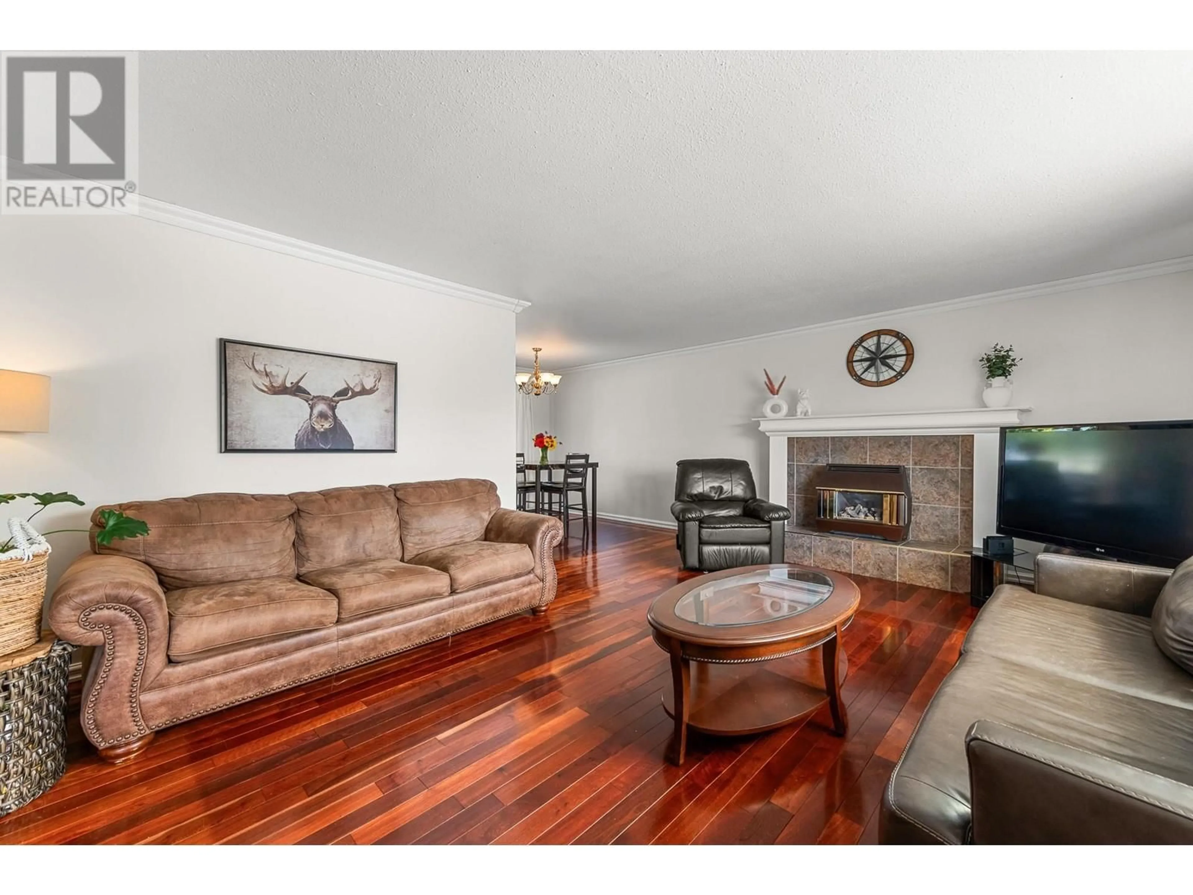 Living room, wood floors for 781 CARMI Avenue, Penticton British Columbia V2A3G9