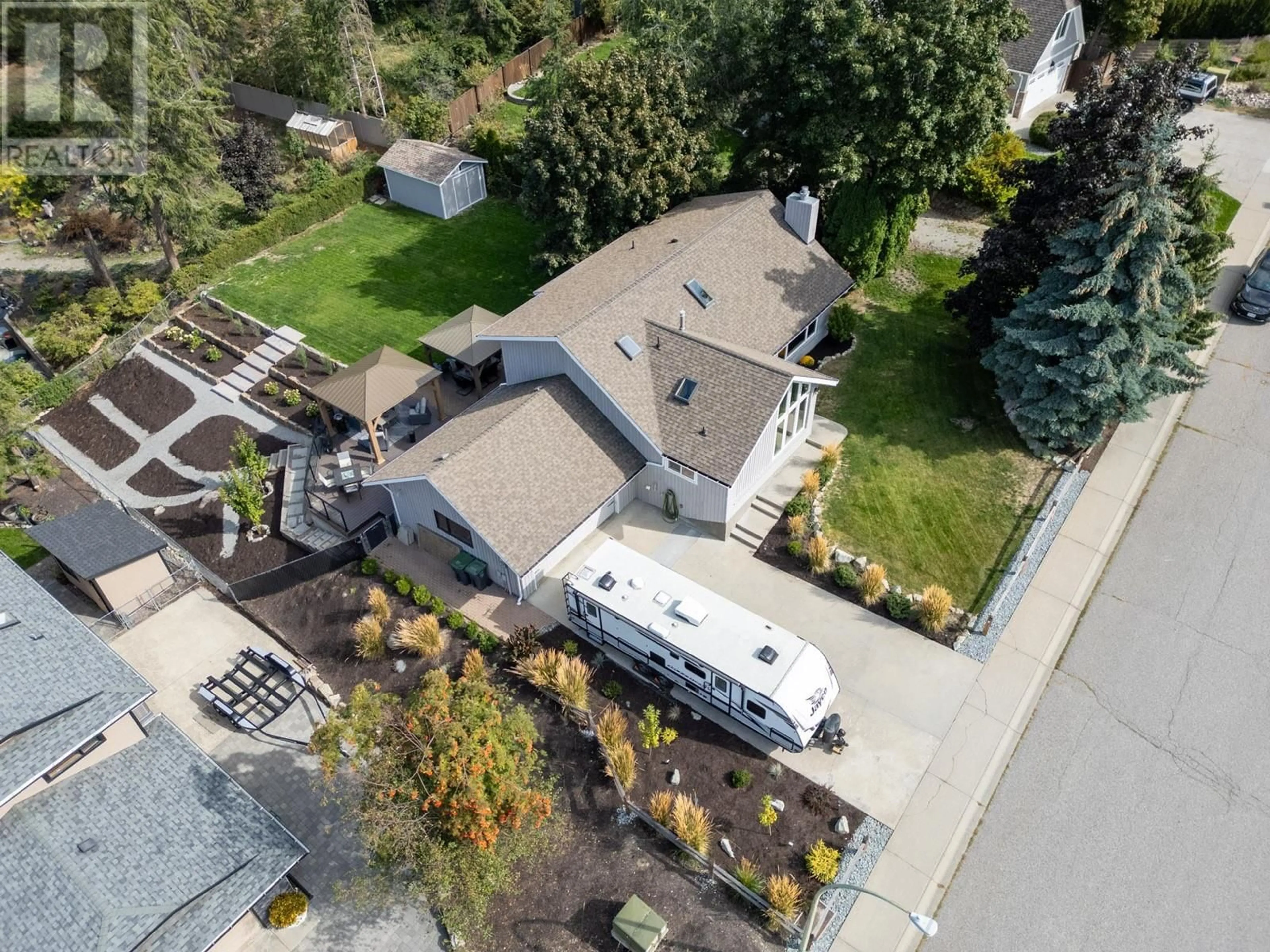 Frontside or backside of a home, cottage for 4030 Sunshine Road, Kelowna British Columbia V1W3Z6