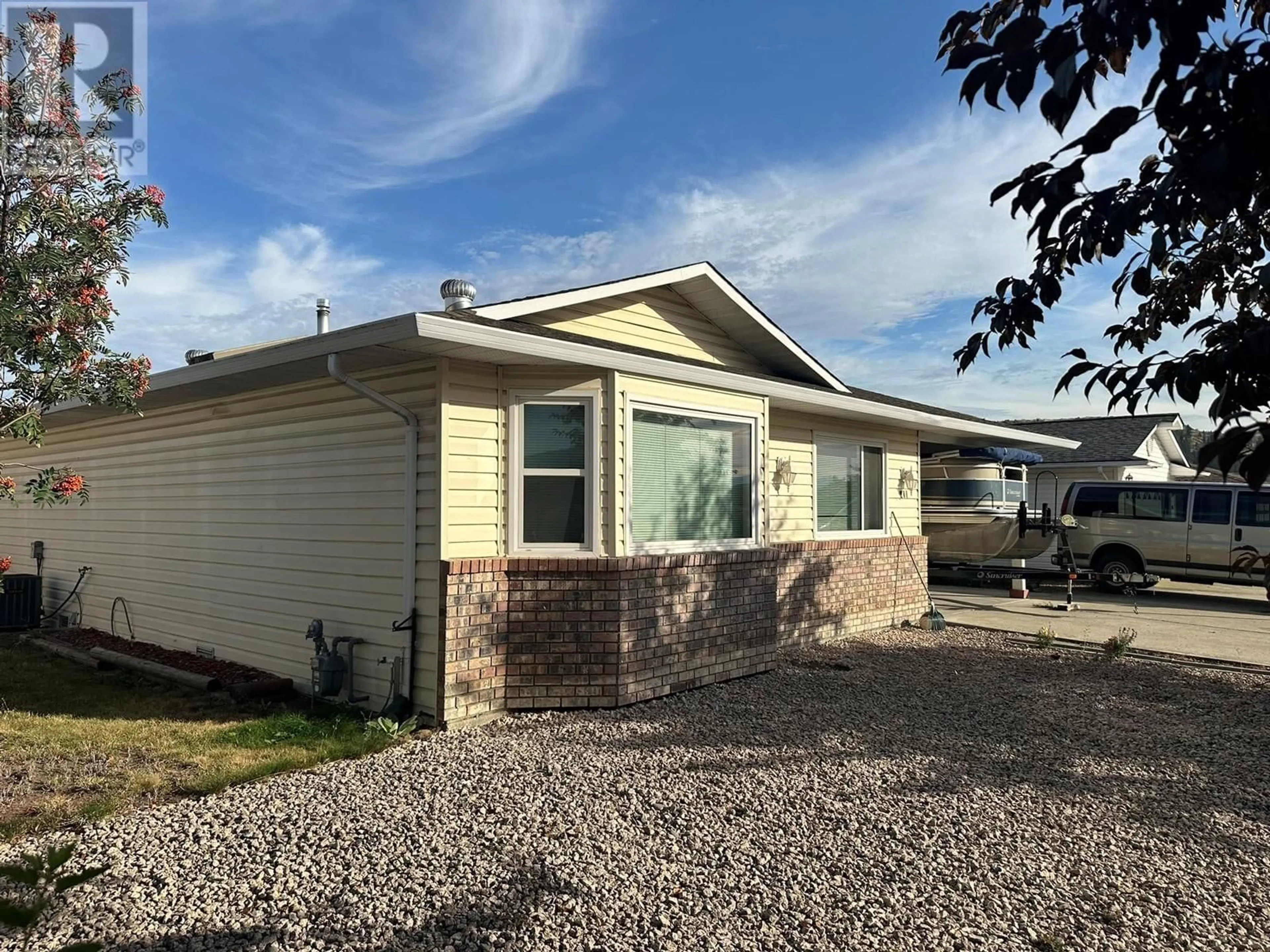 Home with vinyl exterior material, street for 211 2ND STREET, Vernon British Columbia V1H1Z1