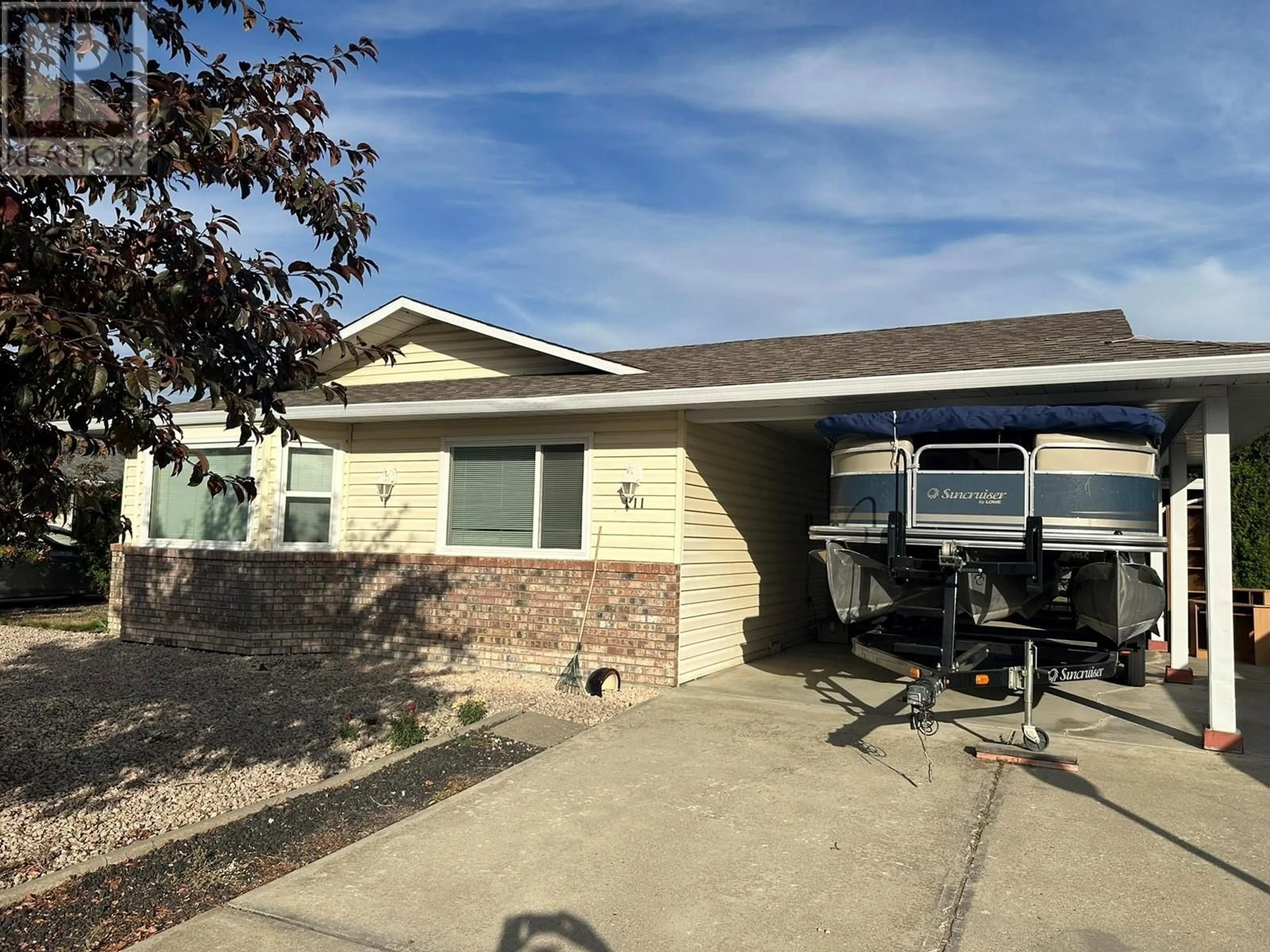 Home with vinyl exterior material, street for 211 2ND STREET, Vernon British Columbia V1H1Z1