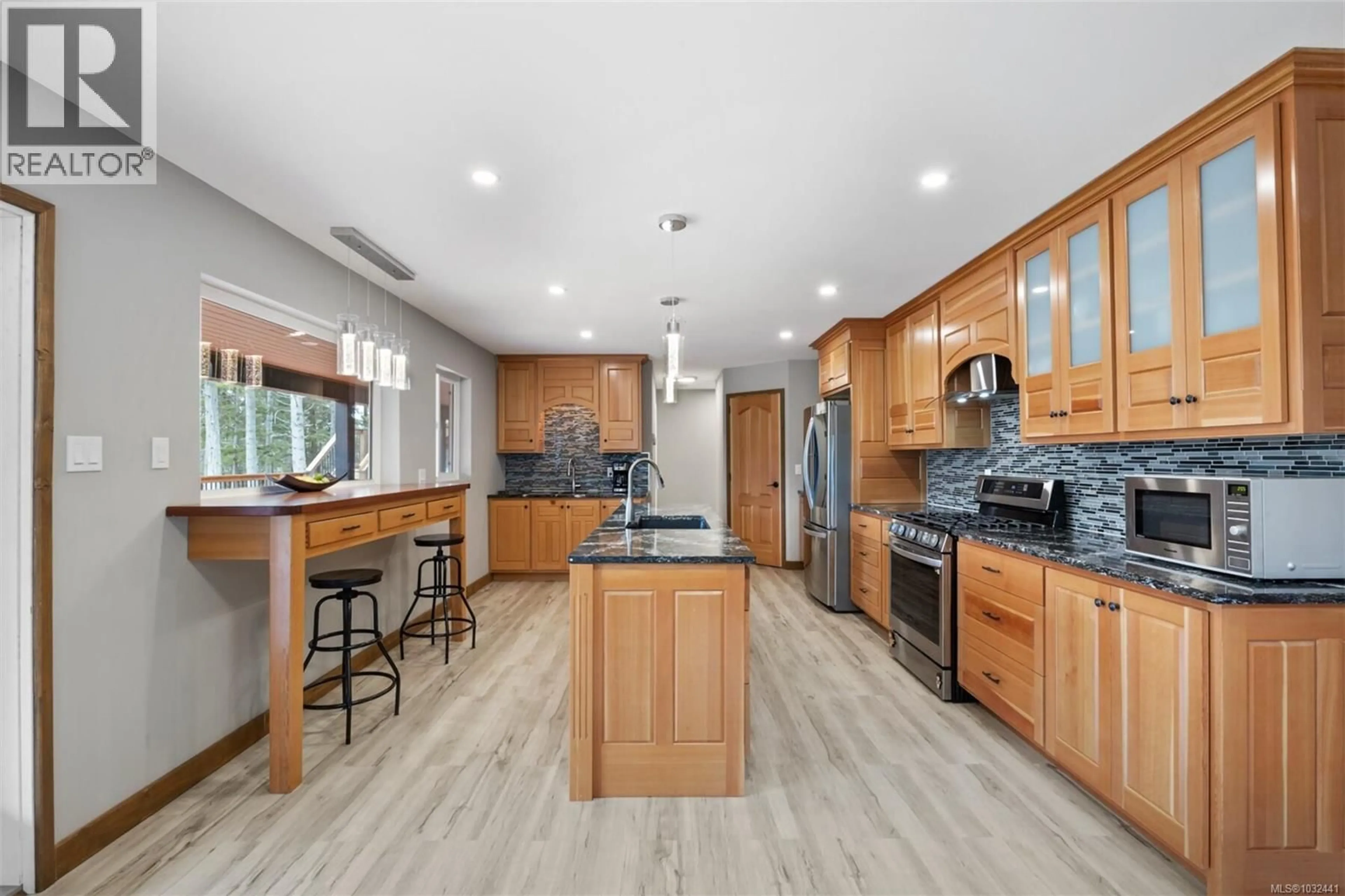 Open concept kitchen, ceramic/tile floor for 2030 SPIKE ROAD, Merville British Columbia V9J1N5