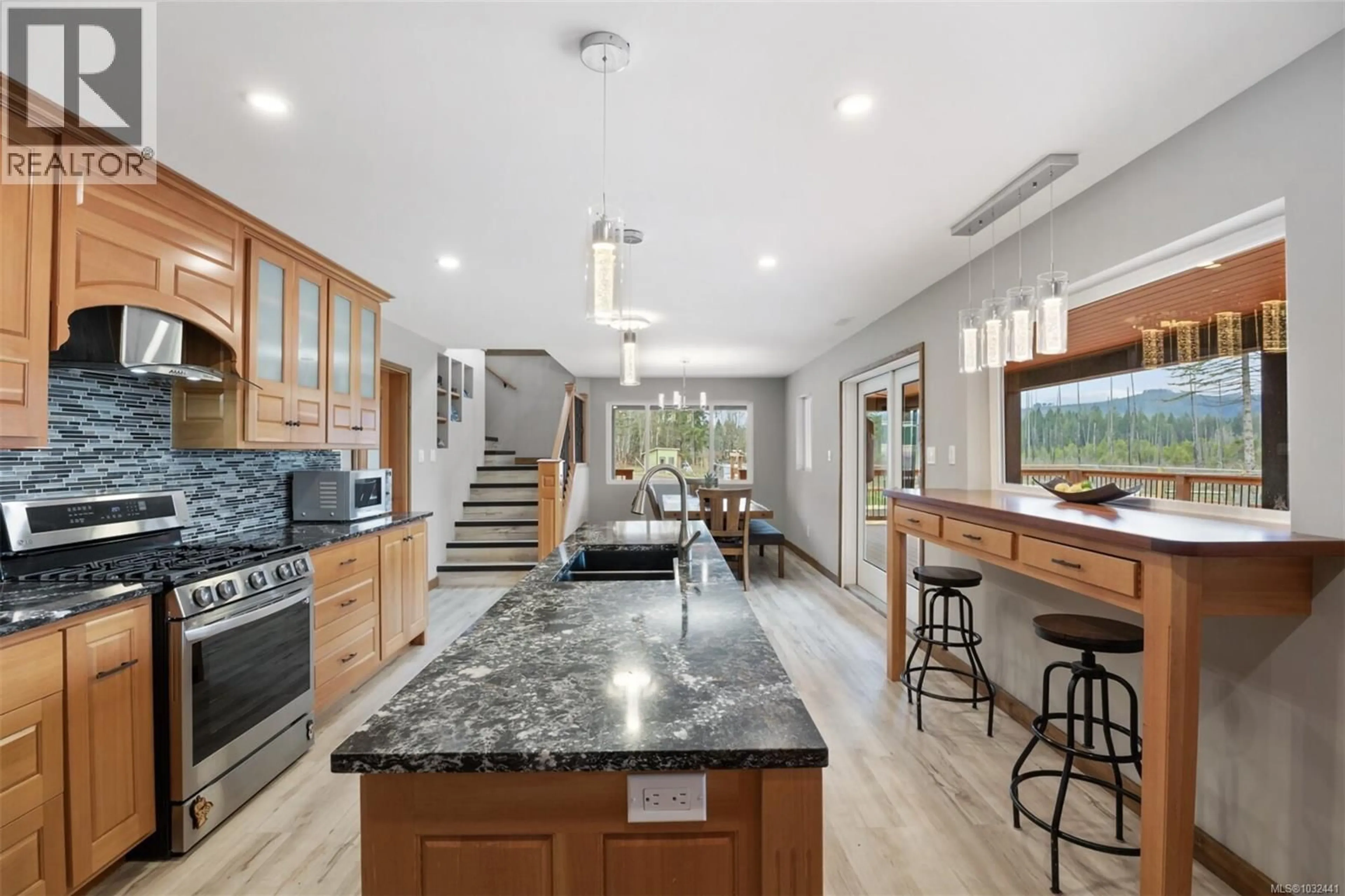 Open concept kitchen, ceramic/tile floor for 2030 SPIKE ROAD, Merville British Columbia V9J1N5