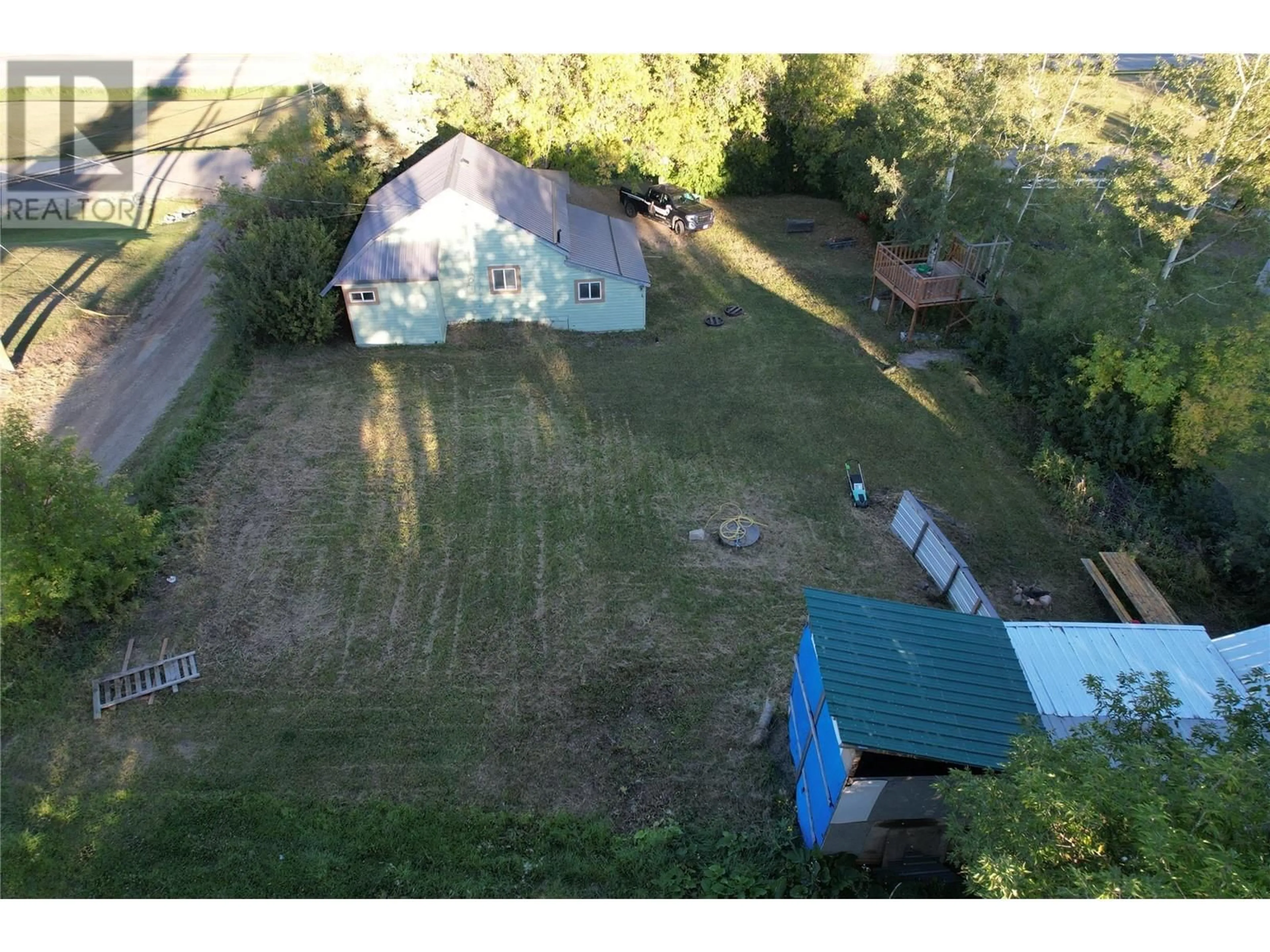 A pic from outside/outdoor area/front of a property/back of a property/a pic from drone, mountain view for 13217 BROOKBANK OTHER, Pouce Coupe British Columbia V0C2C0