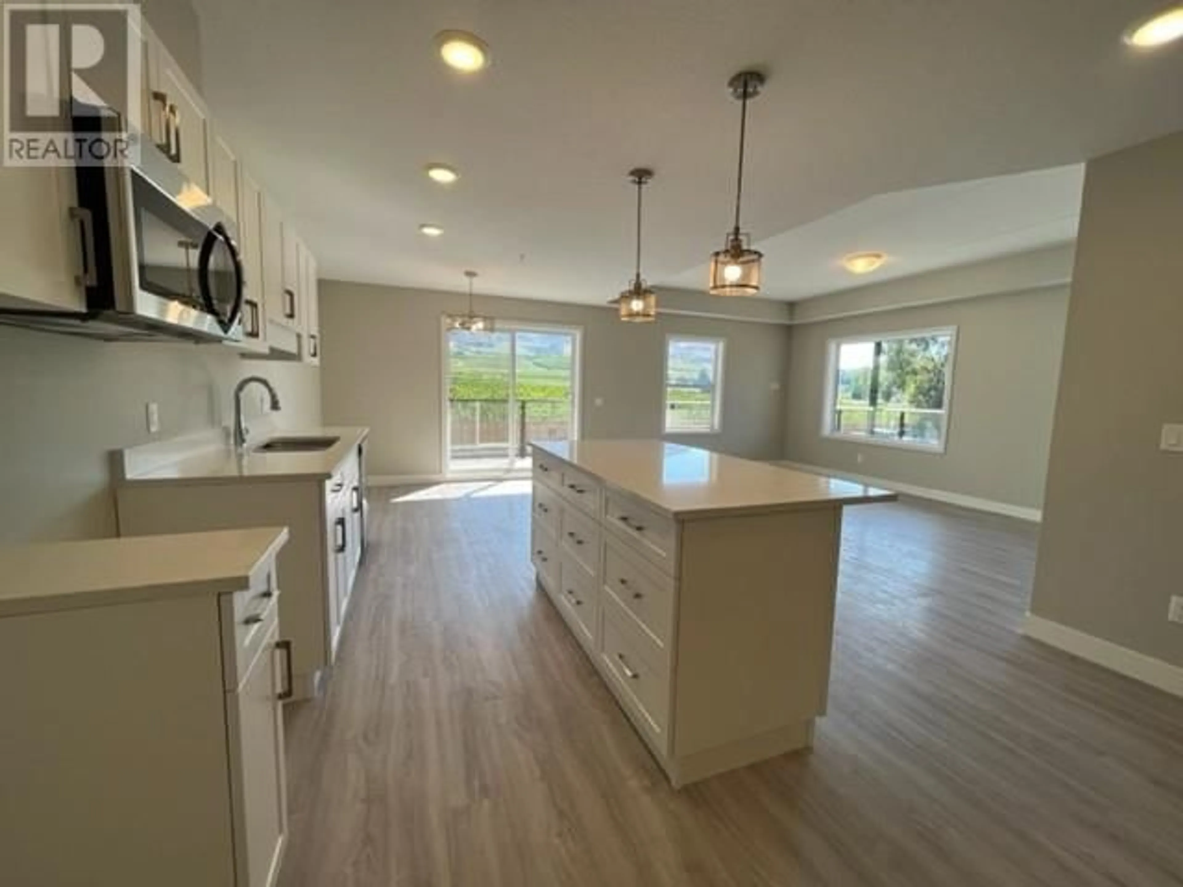 Open concept kitchen for 5640 51st Street Unit# 208, Osoyoos British Columbia V0H1V6