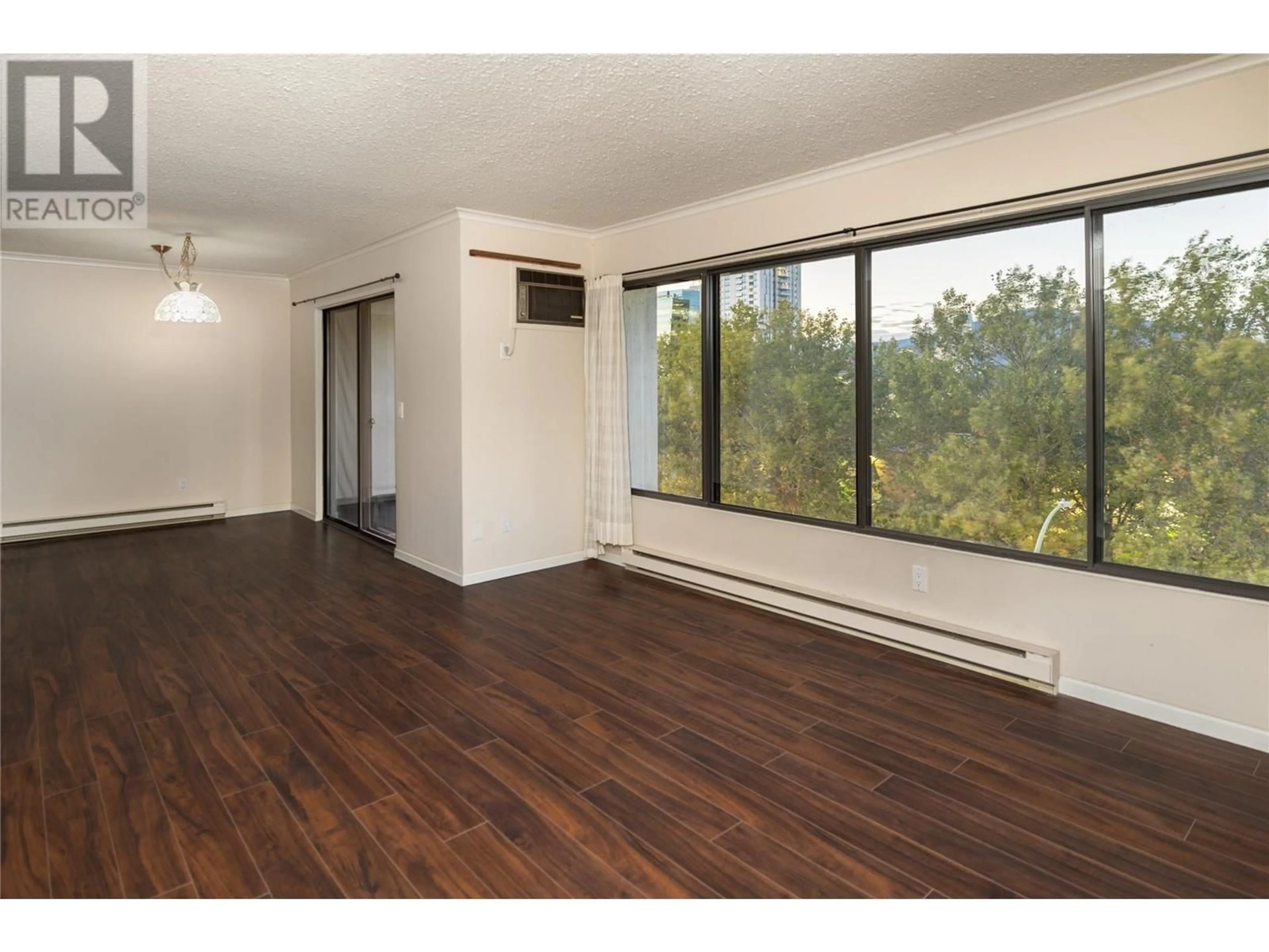 A pic of a room, wood floors for 737 Leon Avenue Unit# 505, Kelowna British Columbia V1Y8L6