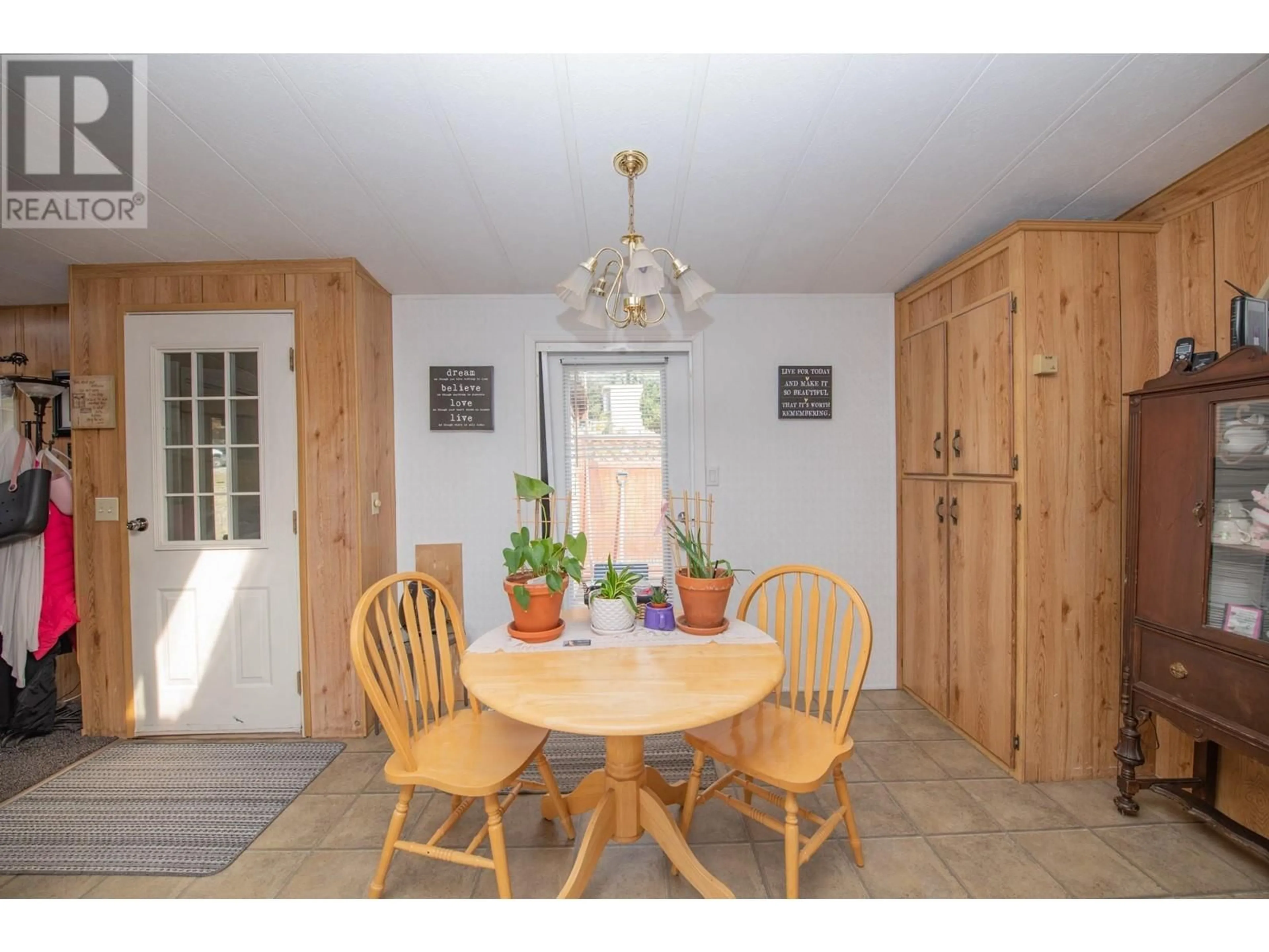 Dining room, wood floors, cottage for 844 Hutley Road Unit# 9, Armstrong British Columbia V0E1B7