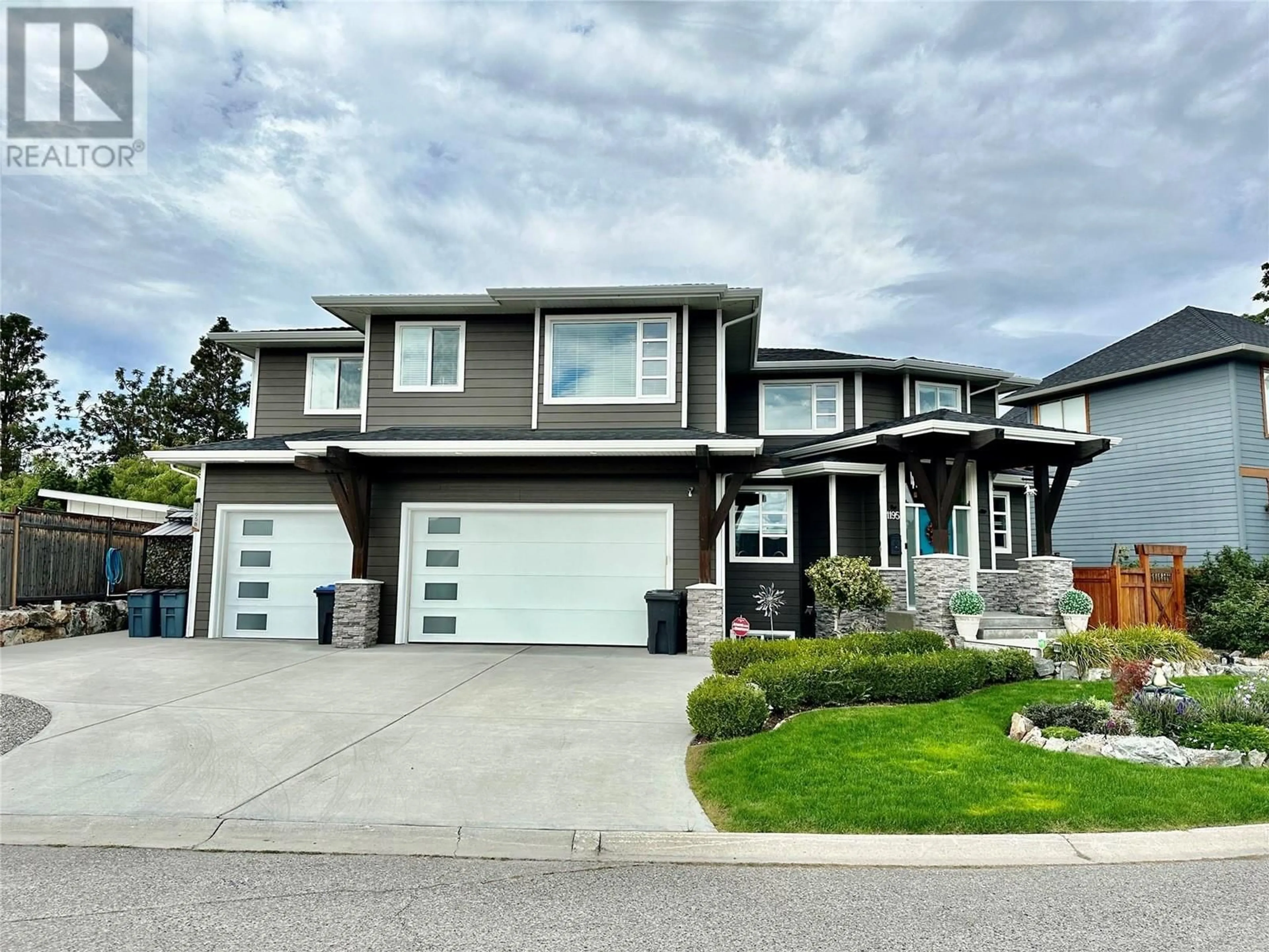 Frontside or backside of a home, the street view for 1195 Koby Court, Kelowna British Columbia V1Y9J9