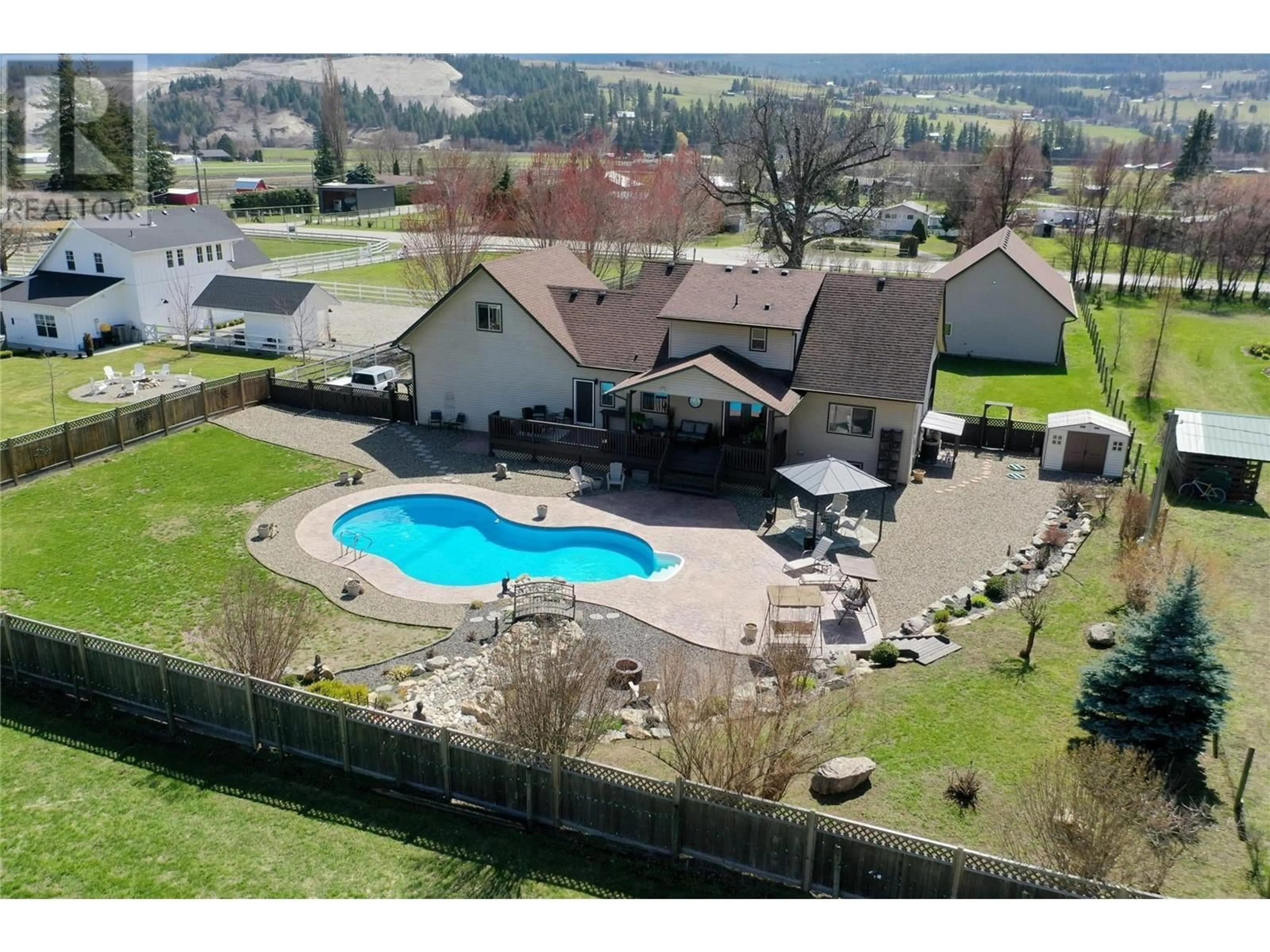 A pic from outside/outdoor area/front of a property/back of a property/a pic from drone, unknown for 5575 HIGHWAY 6 HIGHWAY, Coldstream British Columbia V1T3E2