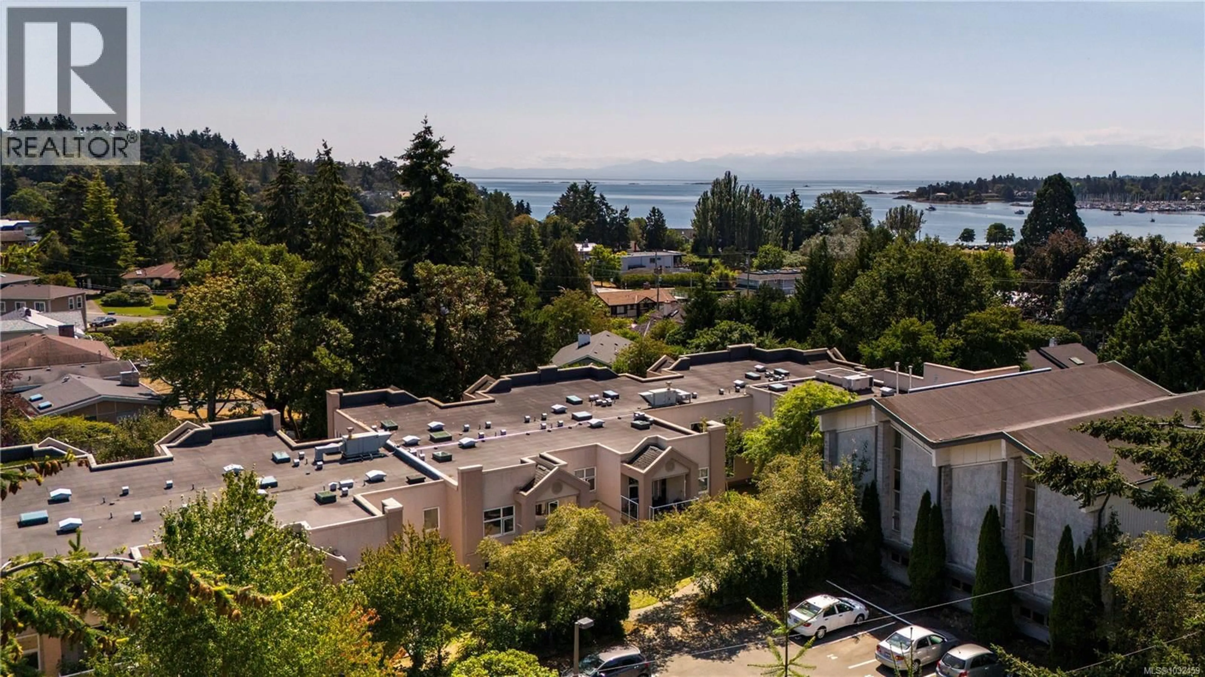 A pic from outside/outdoor area/front of a property/back of a property/a pic from drone, water/lake/river/ocean view for 105 - 3915 ST. GEORGE'S LANE, Saanich British Columbia V8N4E3