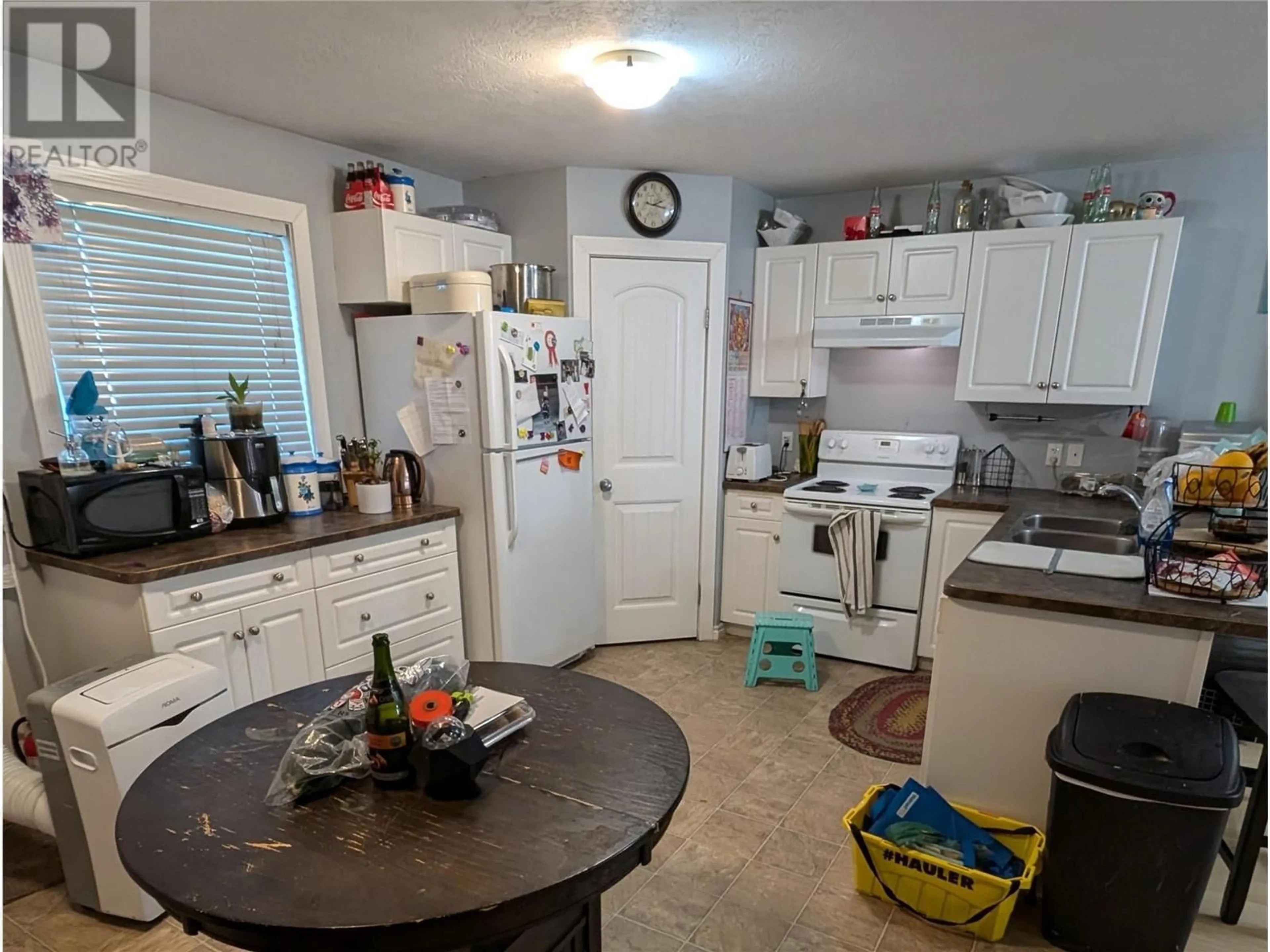 Kitchen, not visible floor, cottage for 312 99 Avenue, Dawson Creek British Columbia V1G1S9