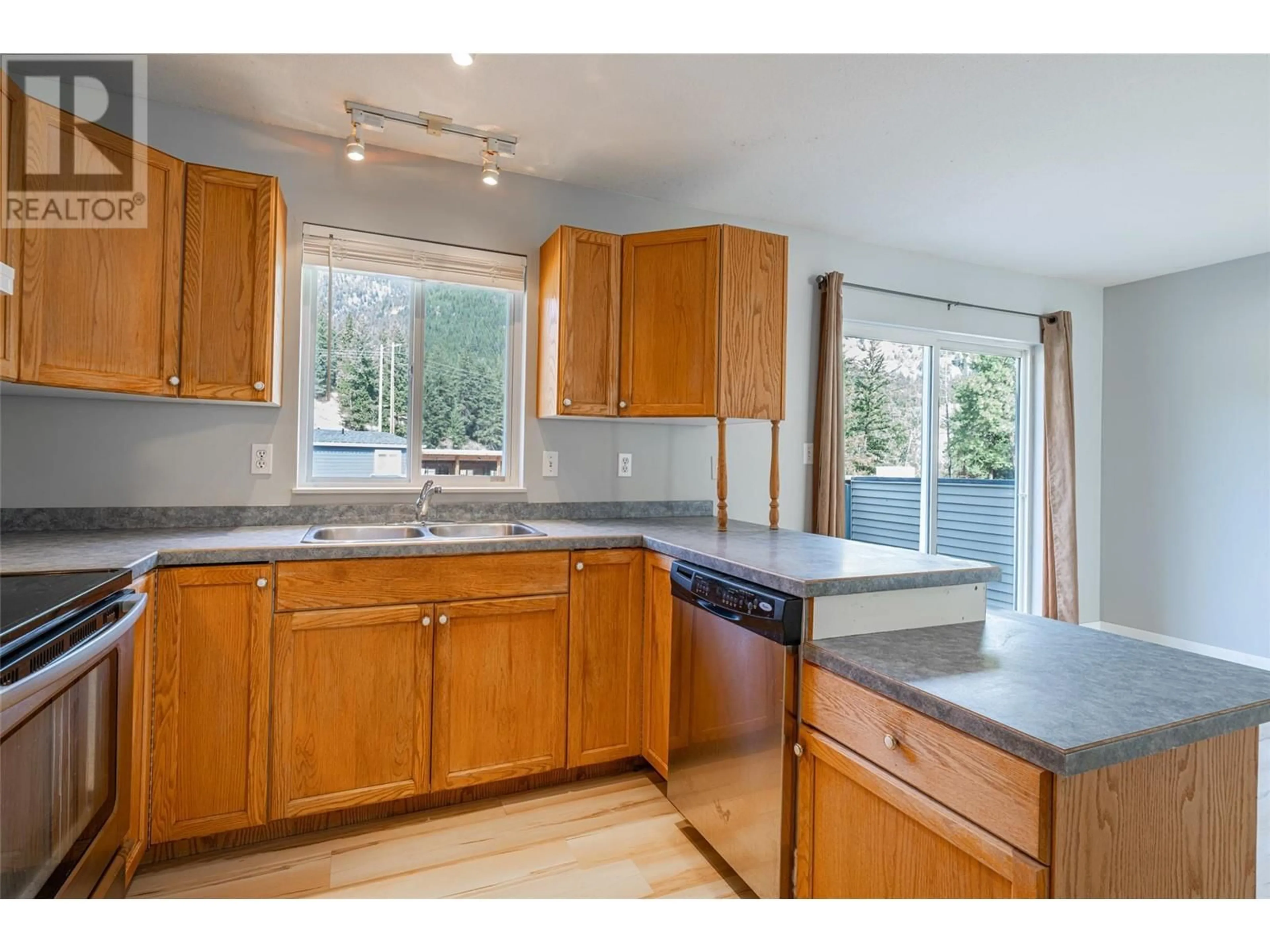 Standard kitchen, wood floors for 5830 Westwynd Drive, Falkland British Columbia V0E1W0